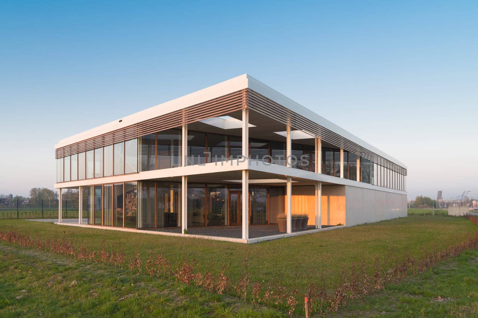 modern newly build office building in sunset light