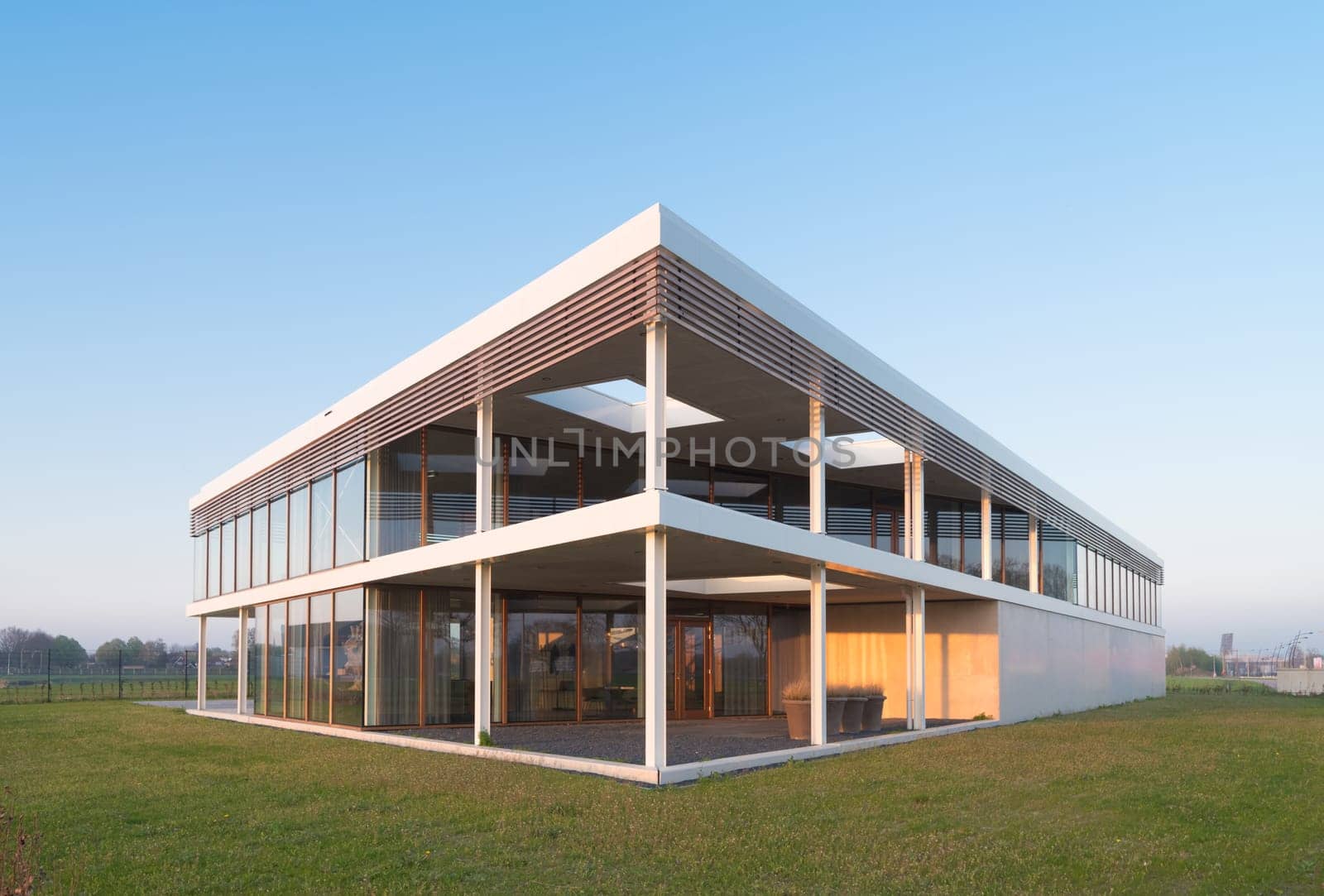 modern newly build office building in sunset light