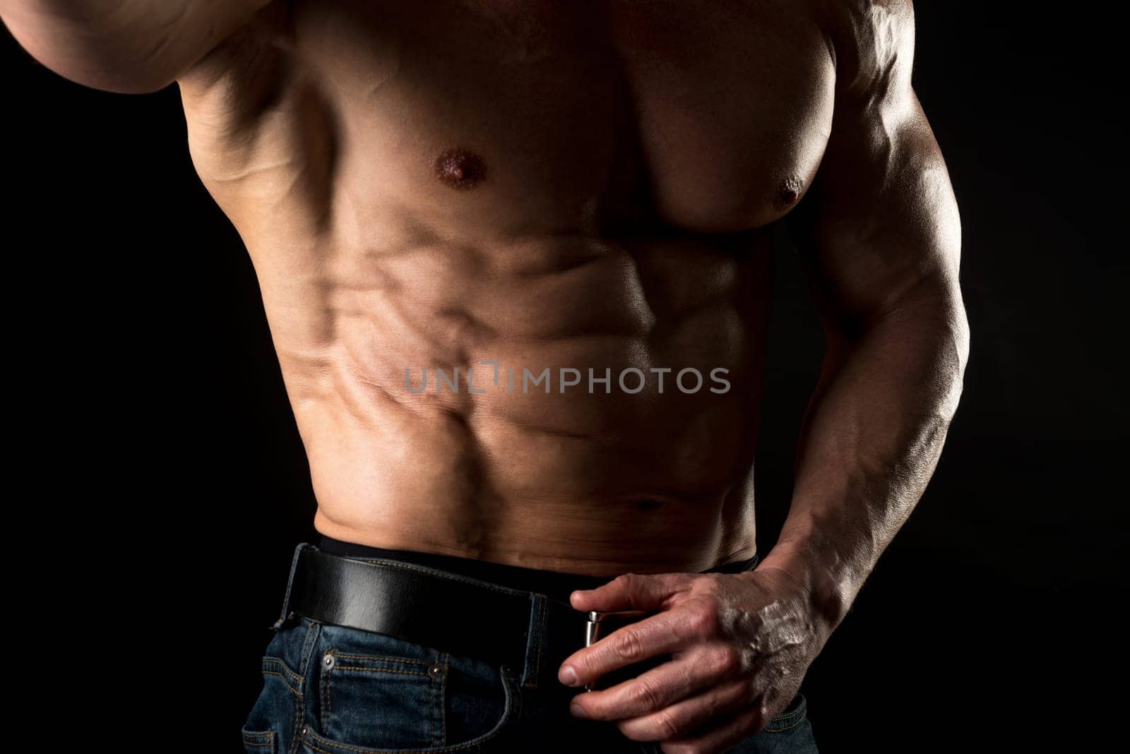 Muscled man's body part with great ripped abs
