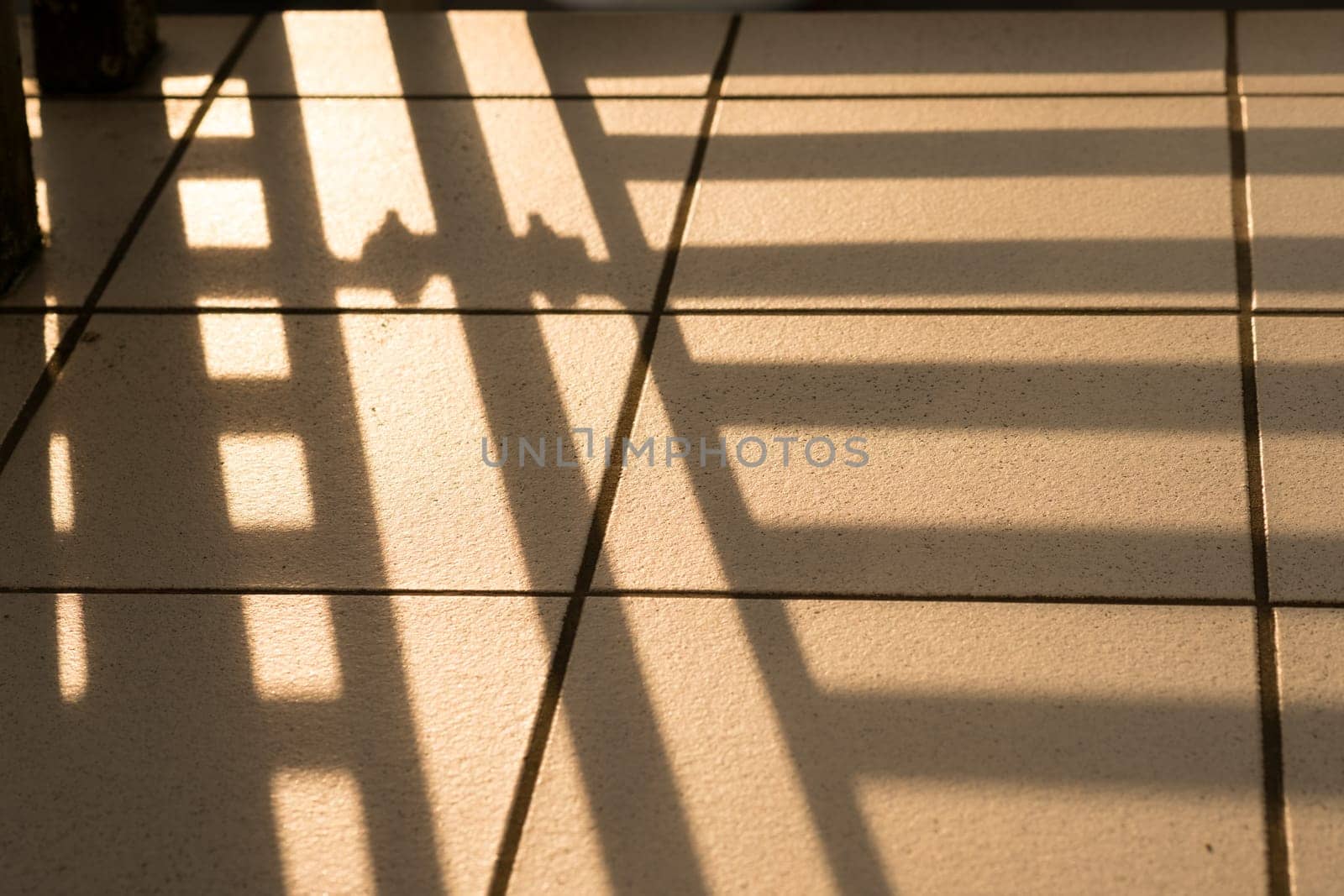 Detail Bakon railing as shade on tiles and joints