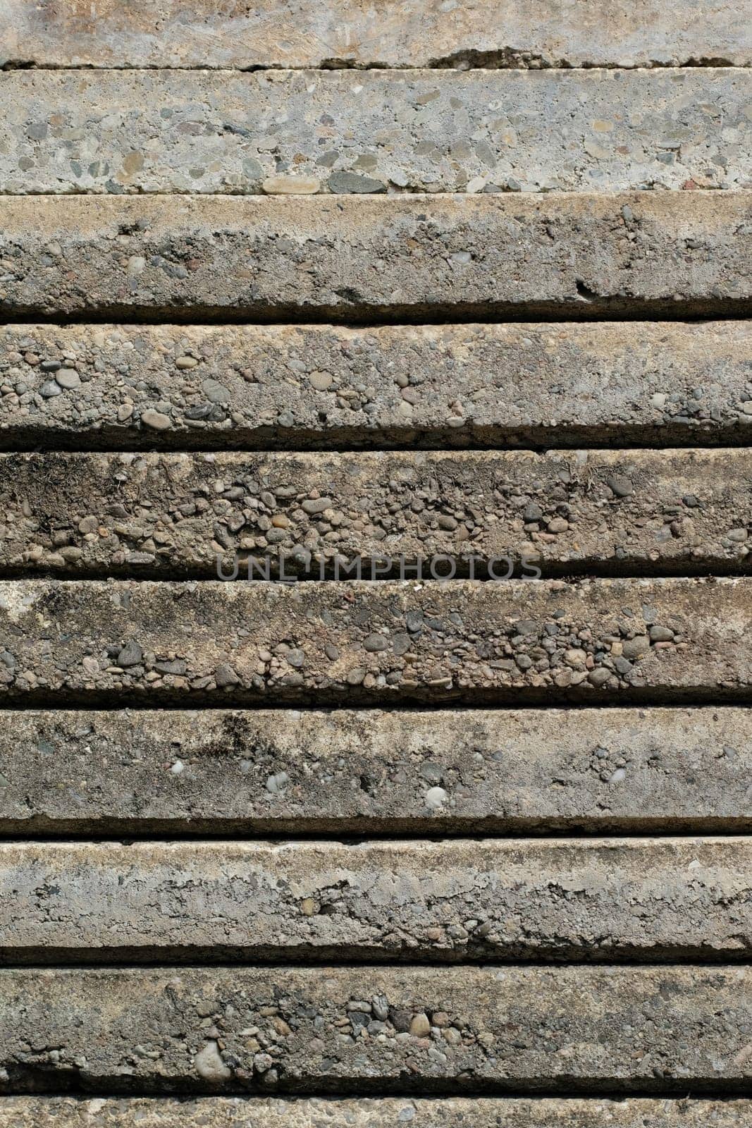 Slabs made of washed concrete as stacks in portrait format