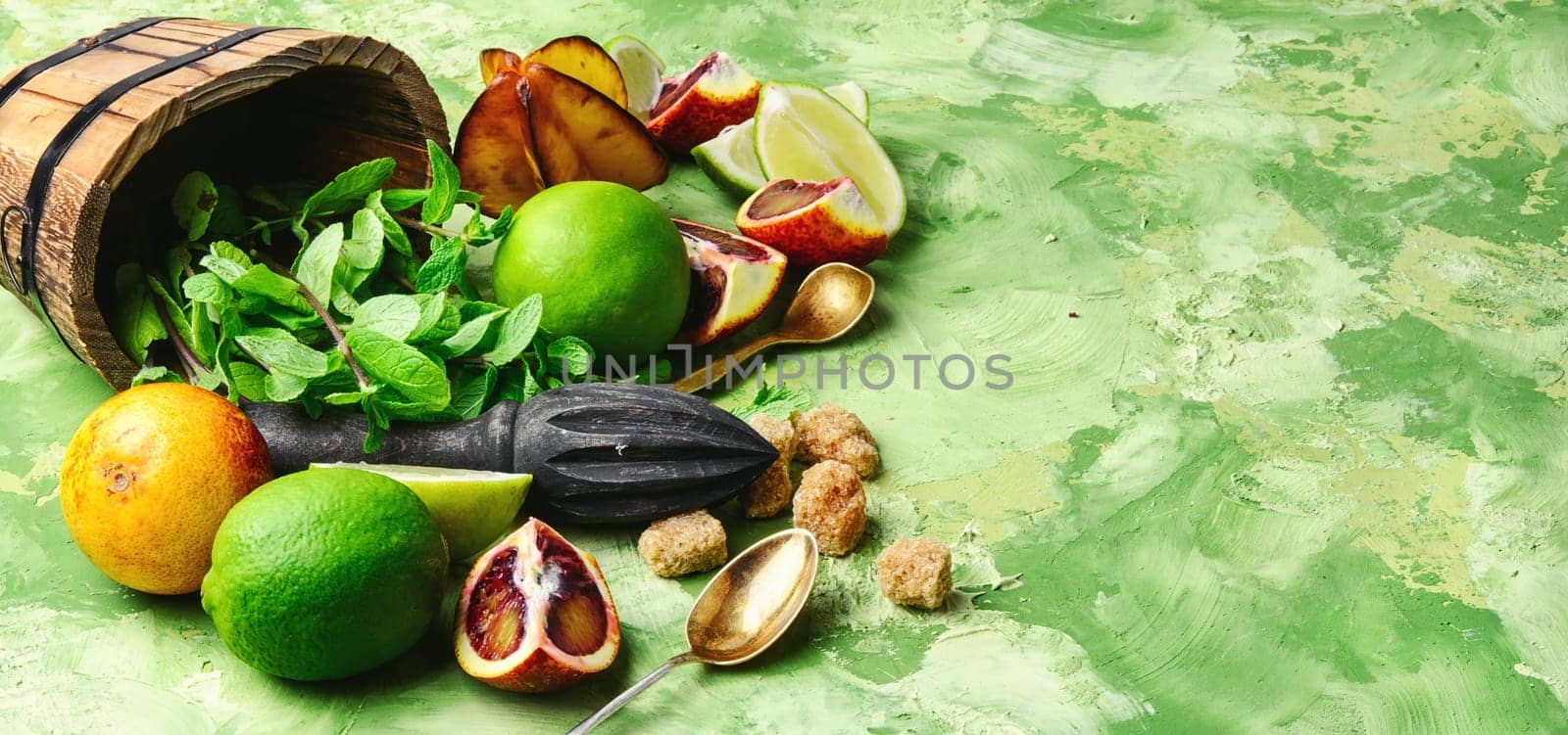 ingredients for summer refreshing drink of lime,mint and orange