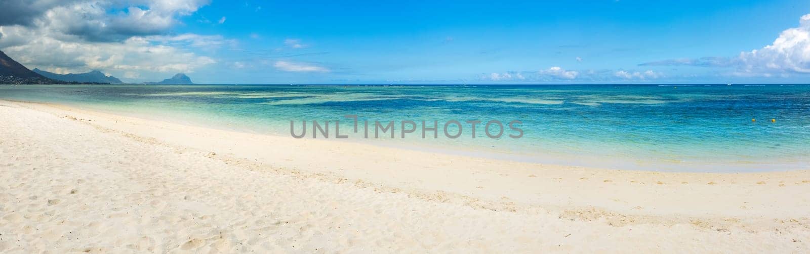 Sandy tropical Wolmar beach at sunny day. Panorama. Mauritius