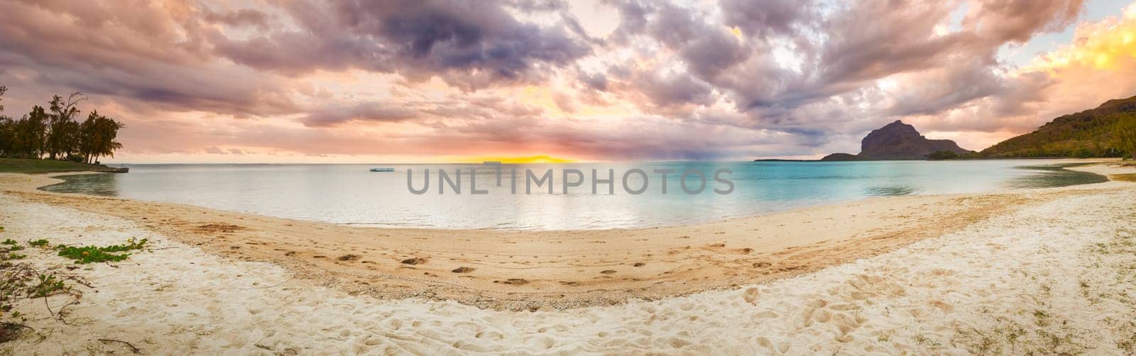 Sandy tropical beach at sunset. Panorama. Mauritius