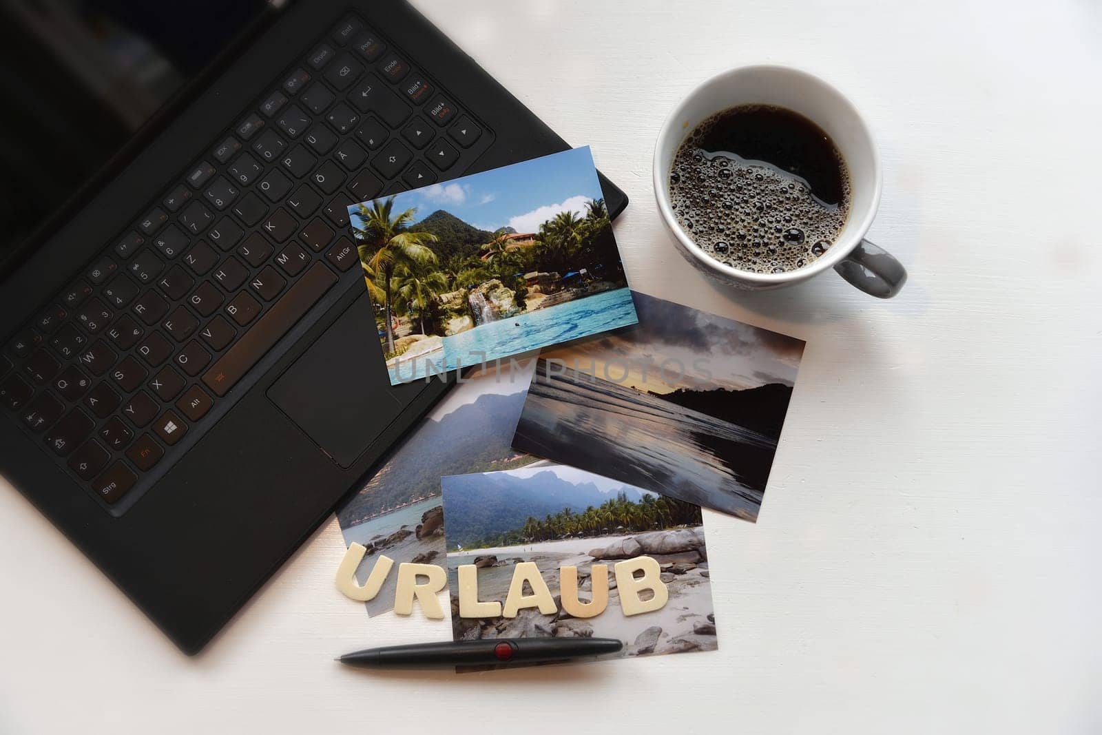 Holiday planning online PC photos coffee