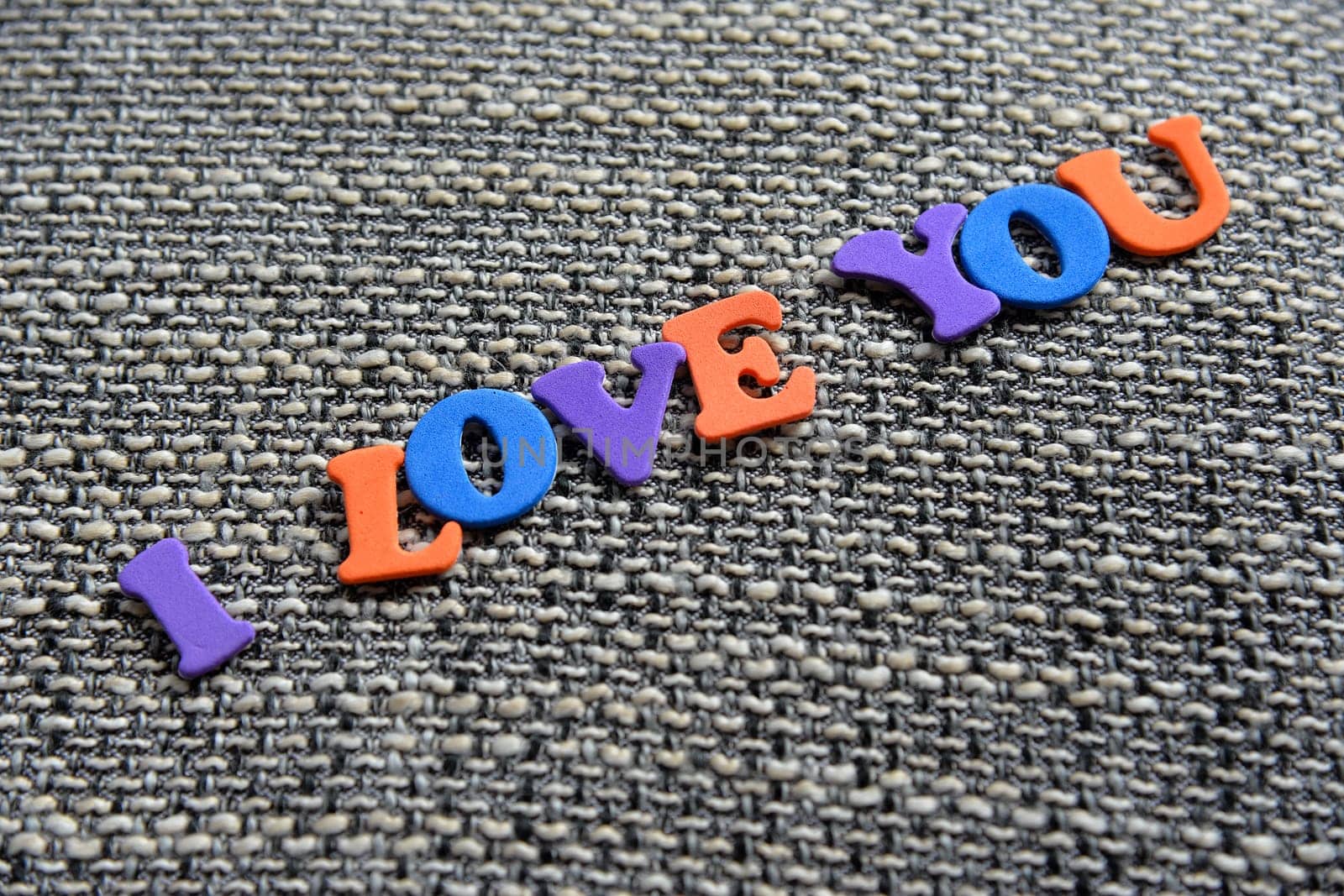 I love You on fabric background