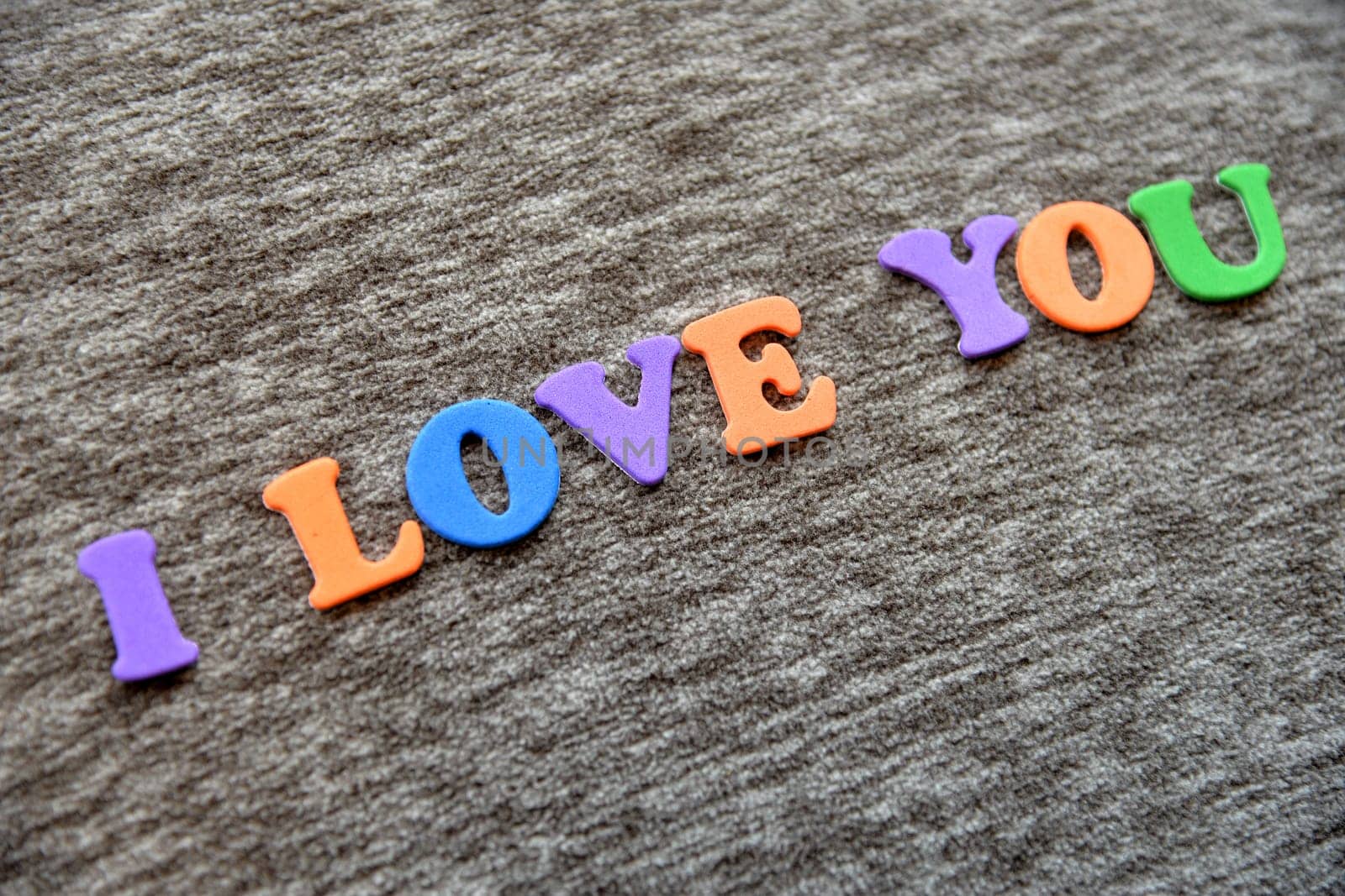 I love You on fabric background
