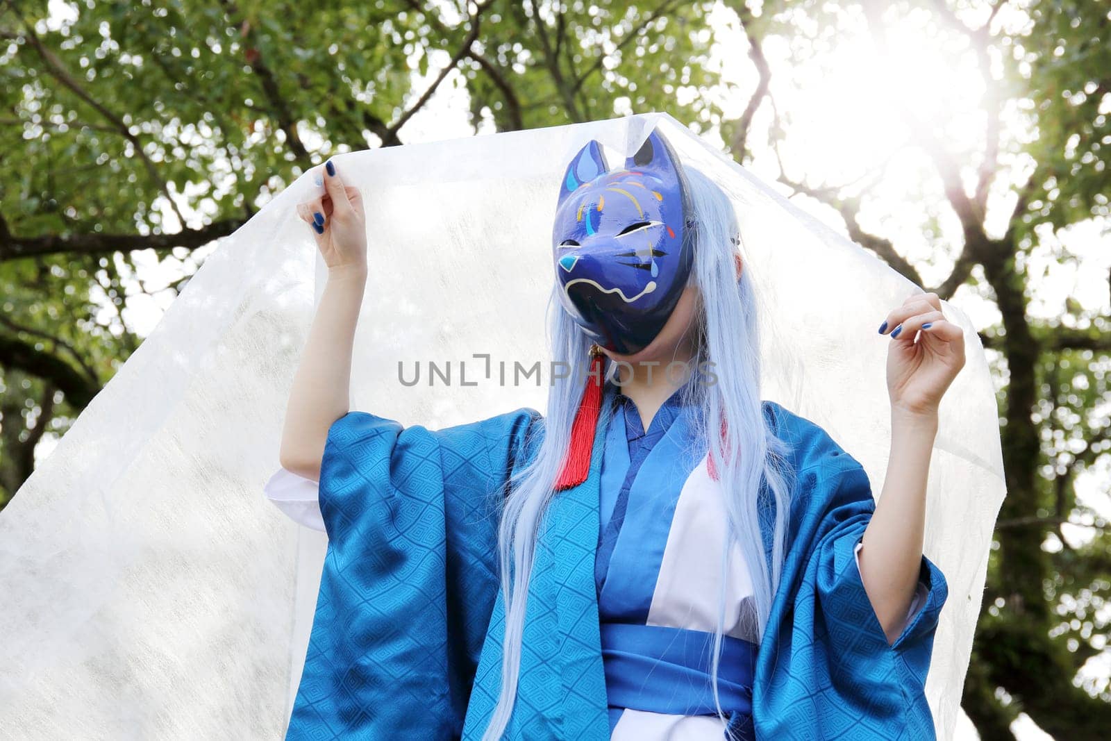 Kagawa, Japan - November 20, 2016: Young japanese girl dressed in cosplay costume at Mamugame-Jou Park. Photo taken in Marugame Cosplay Convention during a meeting of cosplayer.