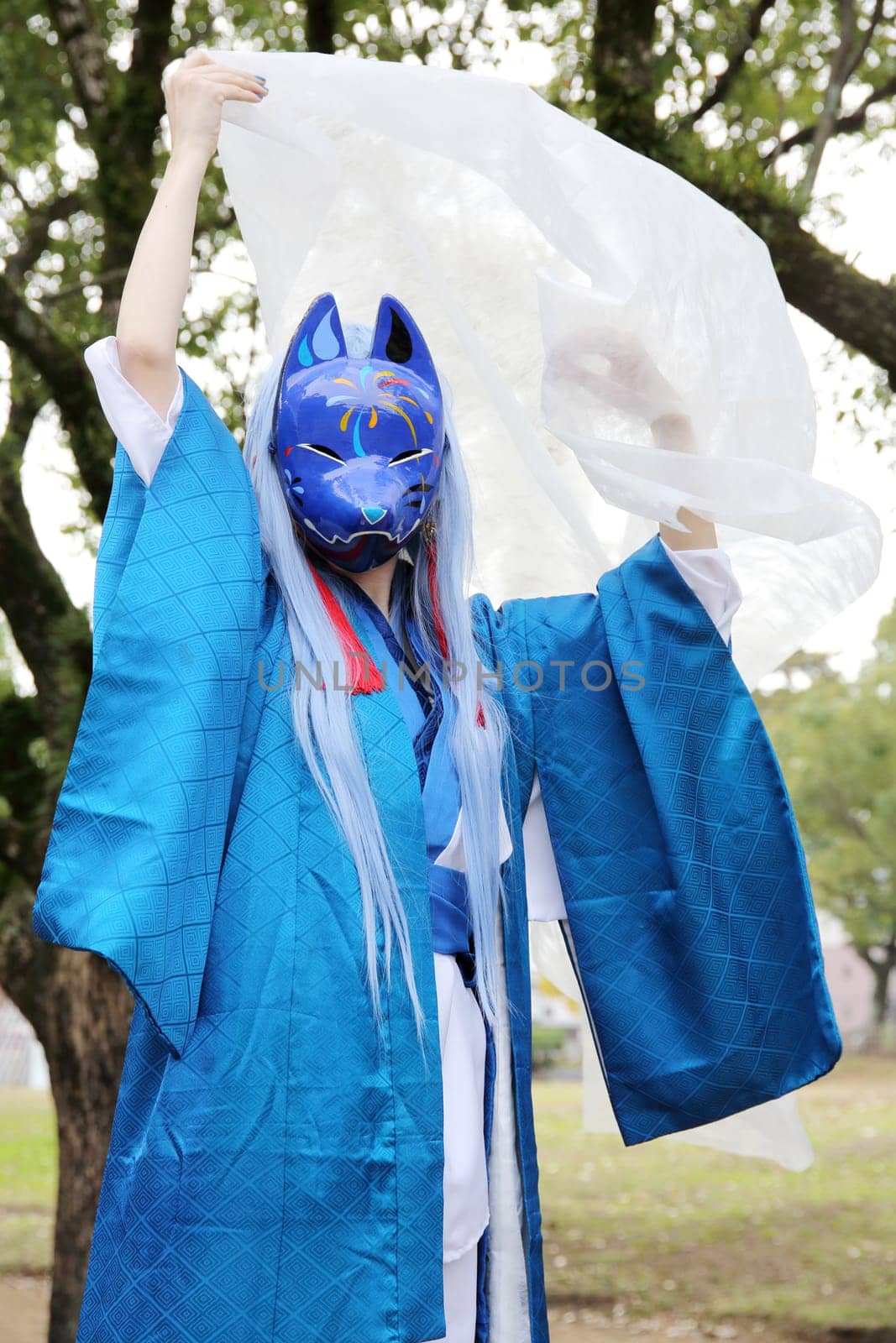 Marugame, Kagawa, Japan - November 20, 2016: Young japanese girl dressed in cosplay costume at Mamugame-Jou Park. Photo taken in Marugame Cosplay Convention during a meeting of cosplayer.