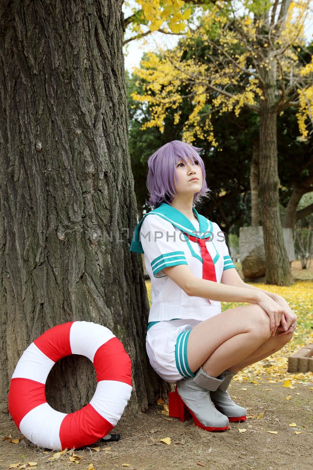 Kagawa, Japan - November 20, 2016: Young japanese girl dressed in cosplay costume at Mamugame-Jou Park. Photo taken in Marugame Cosplay Convention during a meeting of cosplayer.
