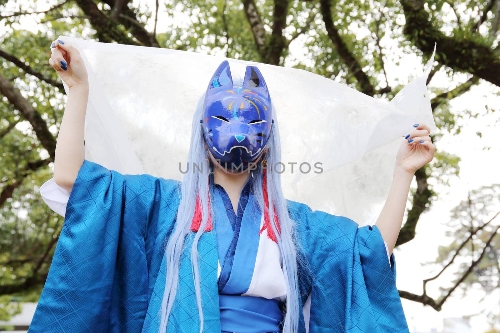 Kagawa, Japan - November 20, 2016: Young japanese girl dressed in cosplay costume at Mamugame-Jou Park. Photo taken in Marugame Cosplay Convention during a meeting of cosplayer.