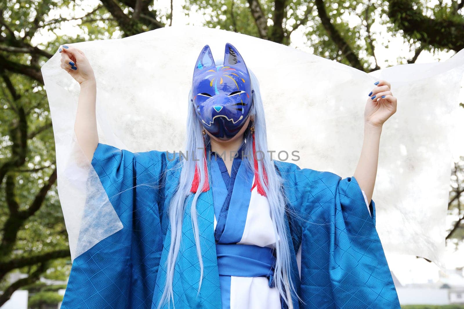 Kagawa, Japan - November 20, 2016: Young japanese girl dressed in cosplay costume at Mamugame-Jou Park. Photo taken in Marugame Cosplay Convention during a meeting of cosplayer.