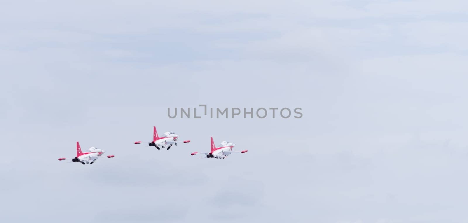 LEEUWARDEN, NETHERLANDS - JUNE 6, 2016: Turkish Star air force demonstration tean performing their stunts during the Dutch Air Force open days