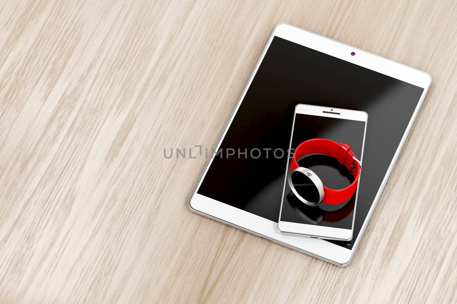 Tablet, smartphone and smartwatch on wood background