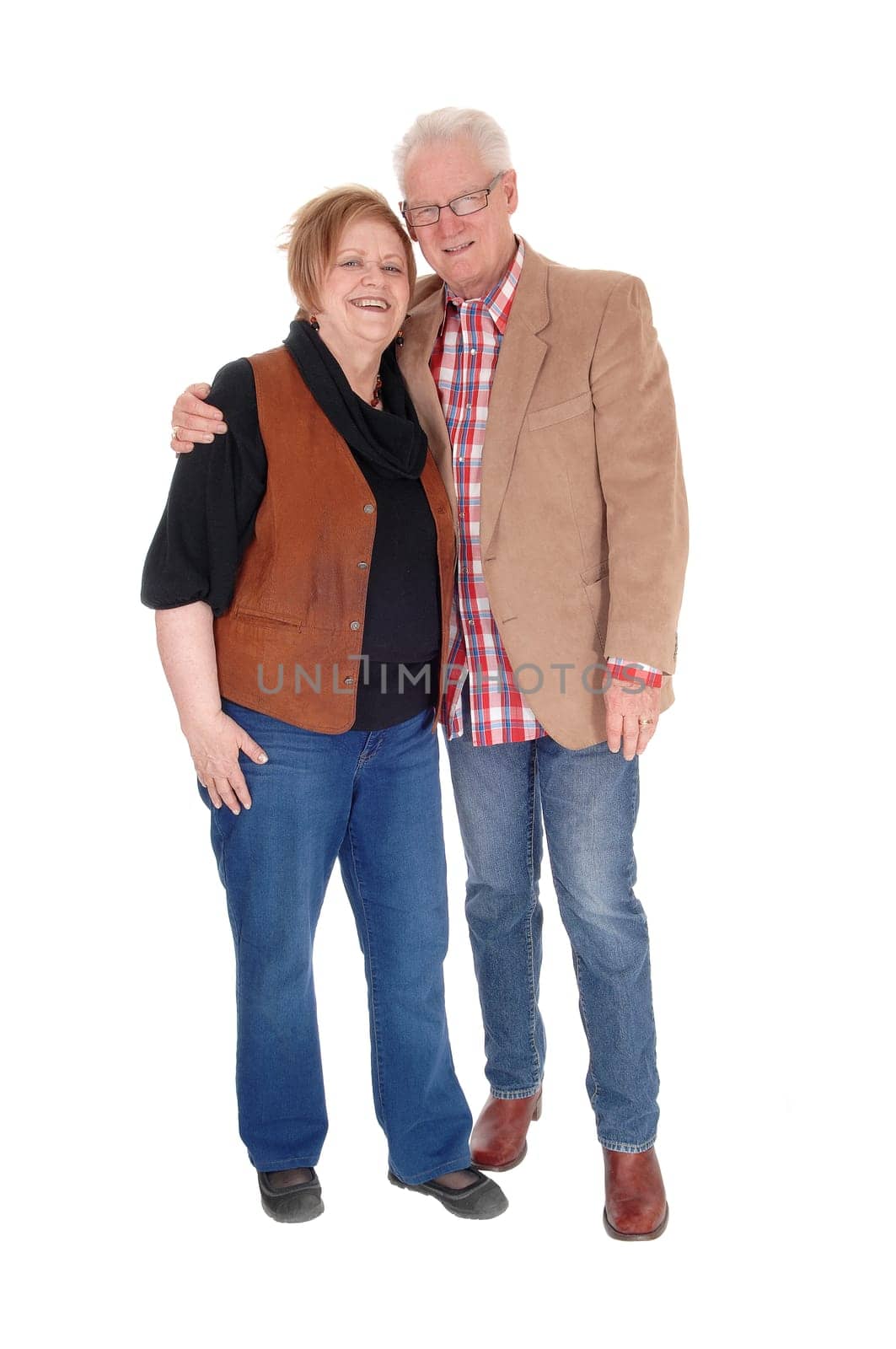 A lovely older couple standing in casual clothing, .smiling, isolated for white background..