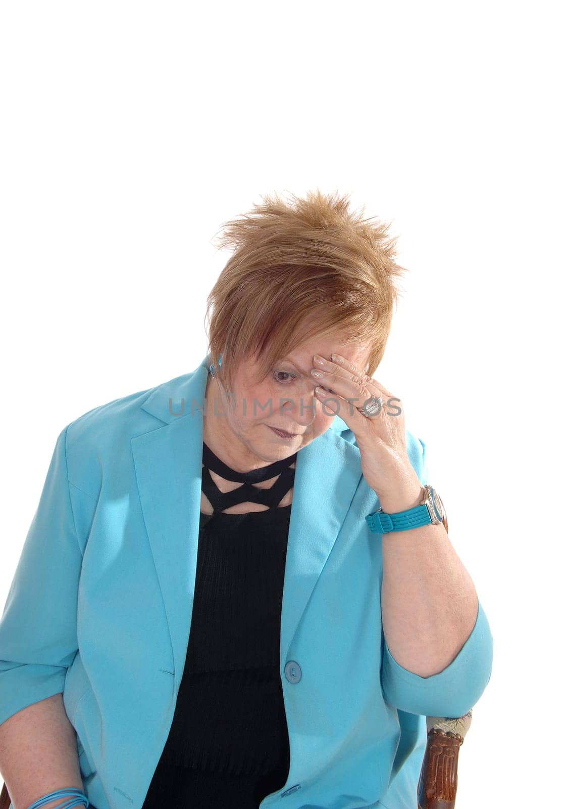 A closeup image of a lovely senior citizen woman with one hand on her.forehead, thinking hard, isolated for white background..