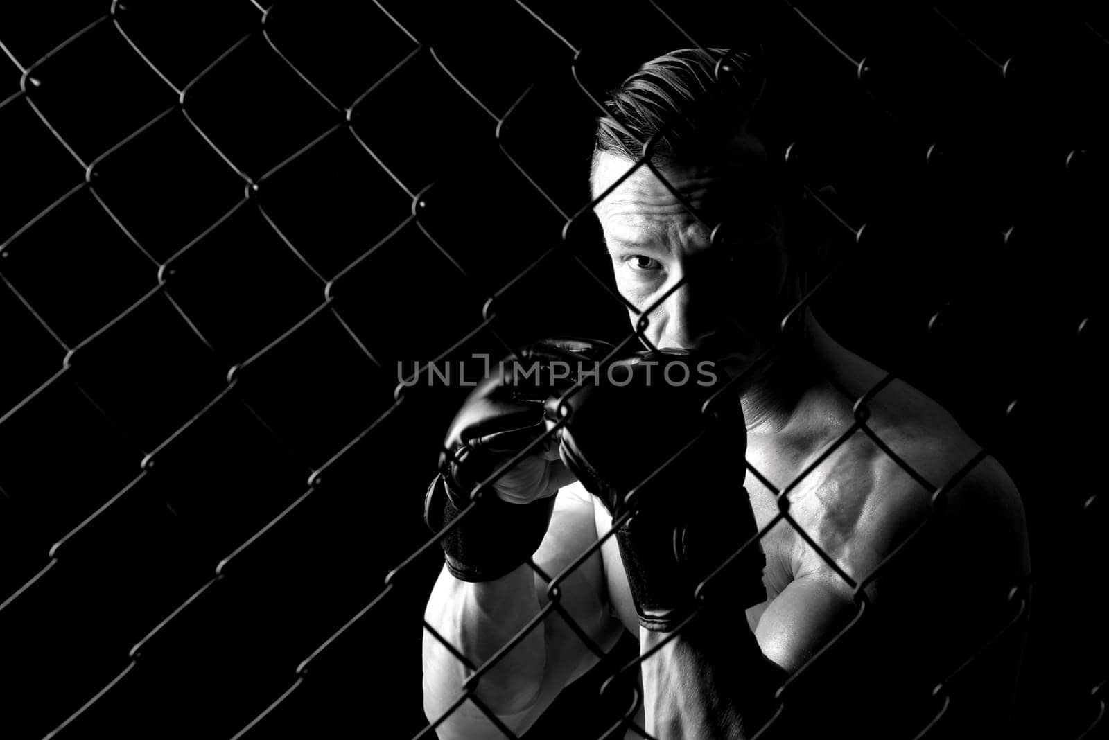 Strong Mixed Martial Arts fighter inside the cage