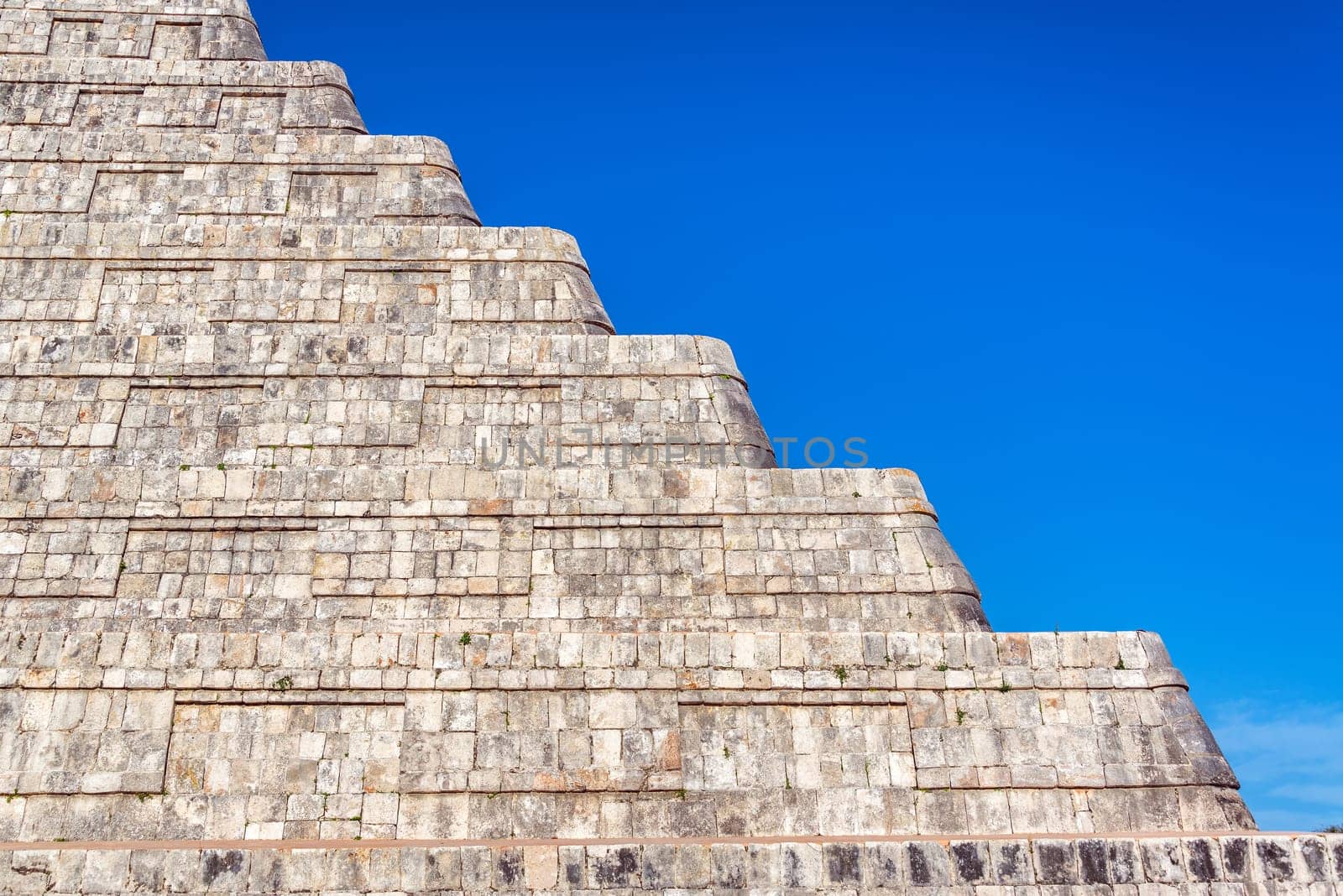 Closeup view of the platforms of the pyramid in the ancient city of Chichen Itza in Mexico