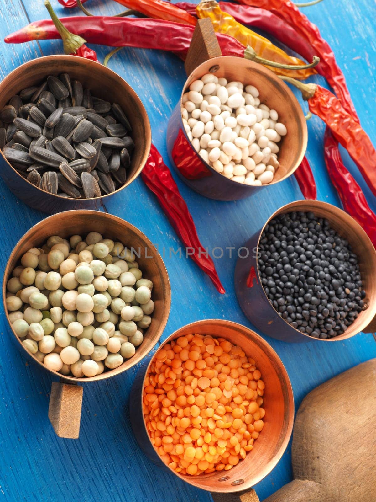 Colorful food ingredients on a blue wooden kitchen table