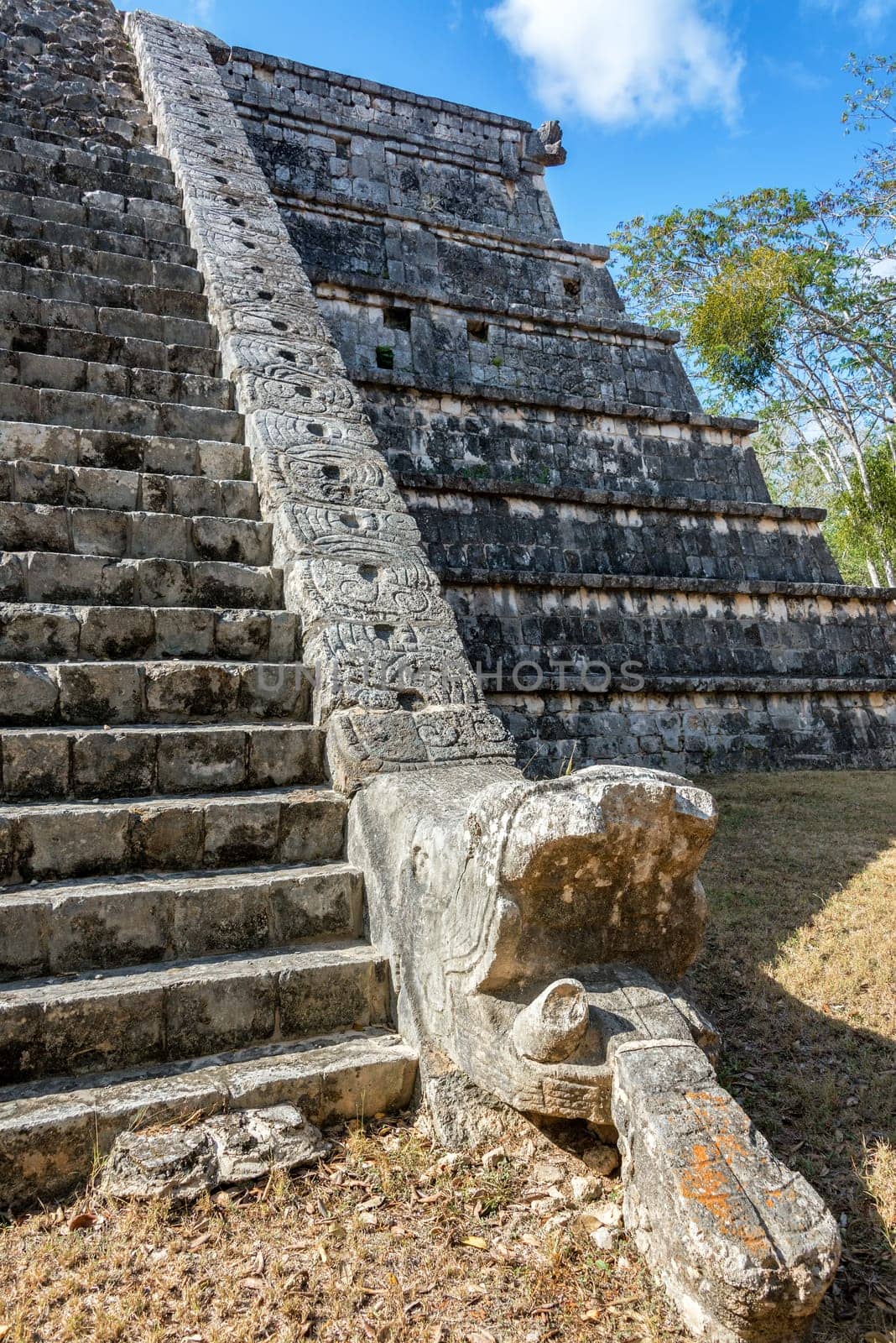 Stairs and snake head on a temple in Chichen Itza, Mexico