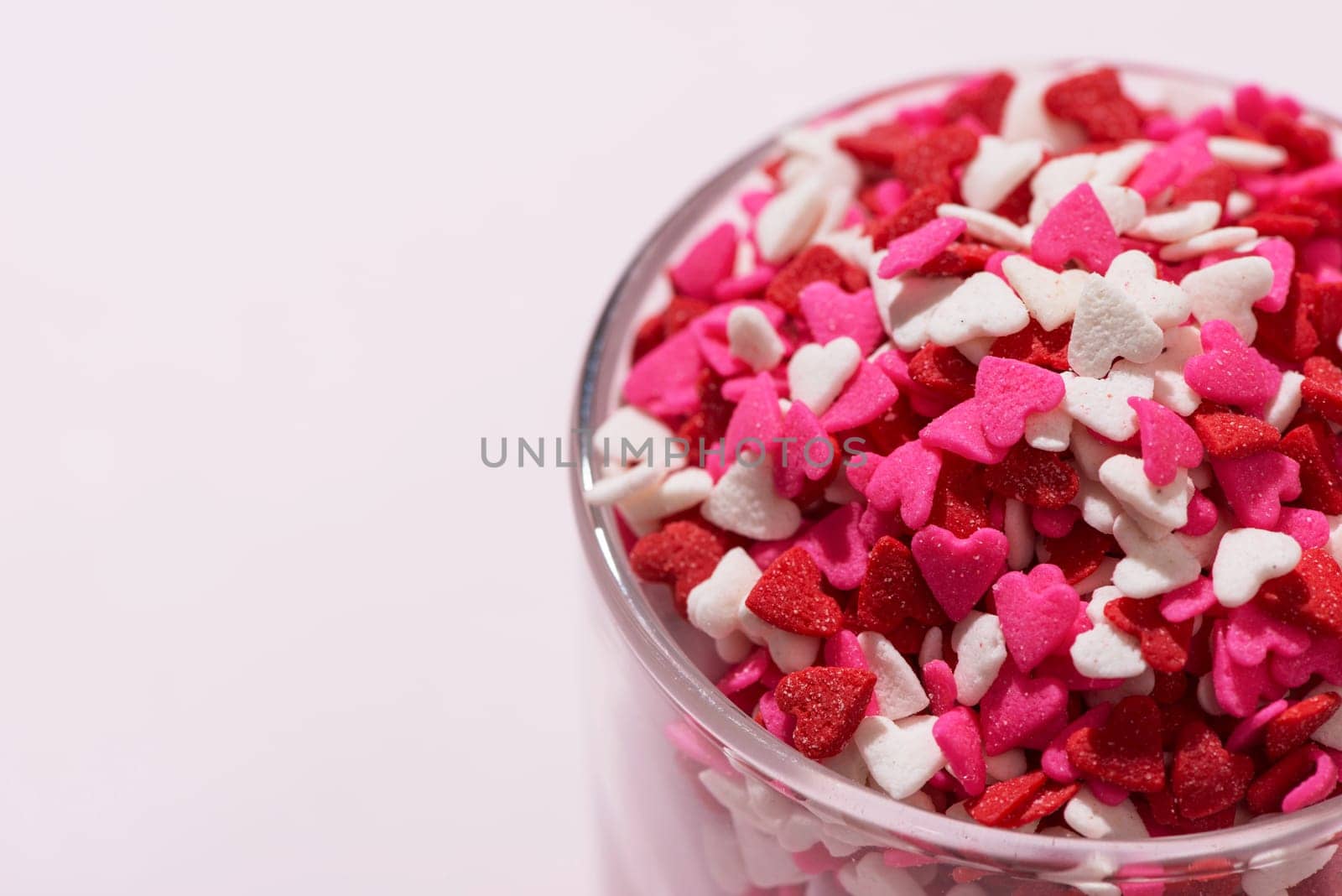 Valentines Day Glass with lots of sweet candy hearts