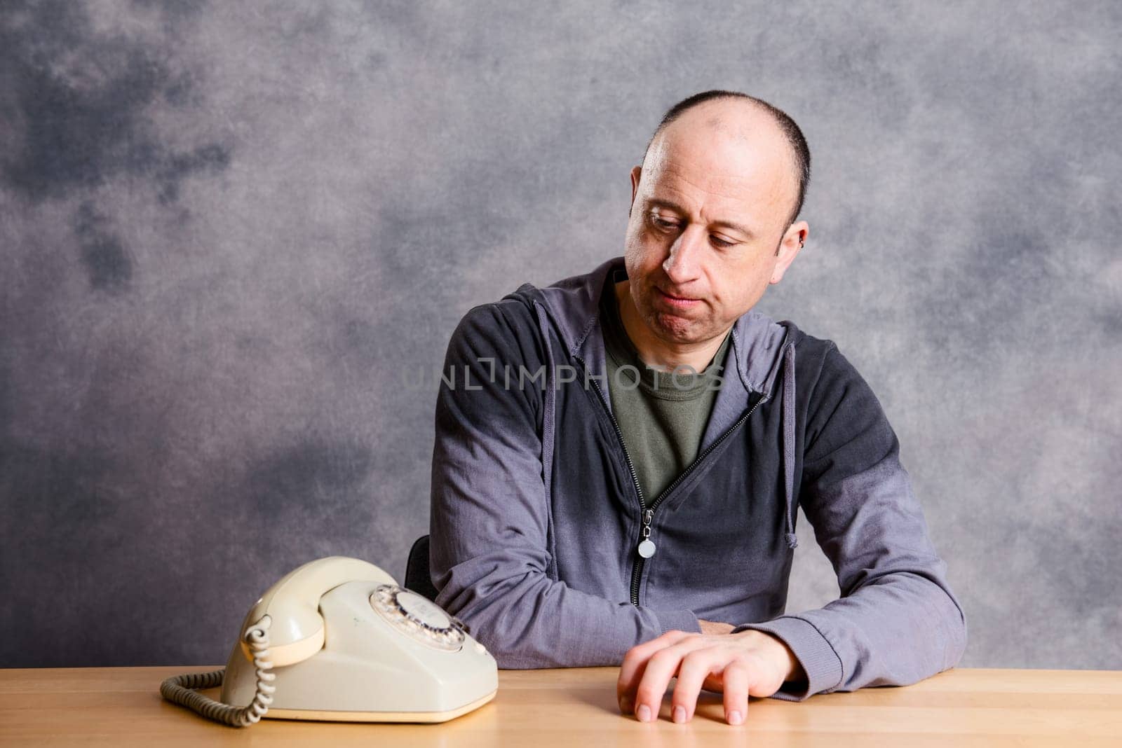 young man waiting for a important phone call