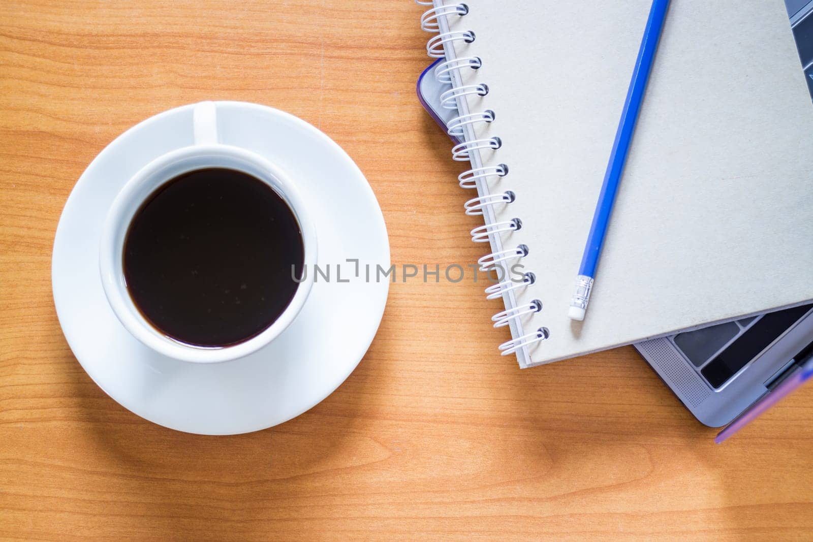 Hot Cup Of Coffee On Working Table, stock photo