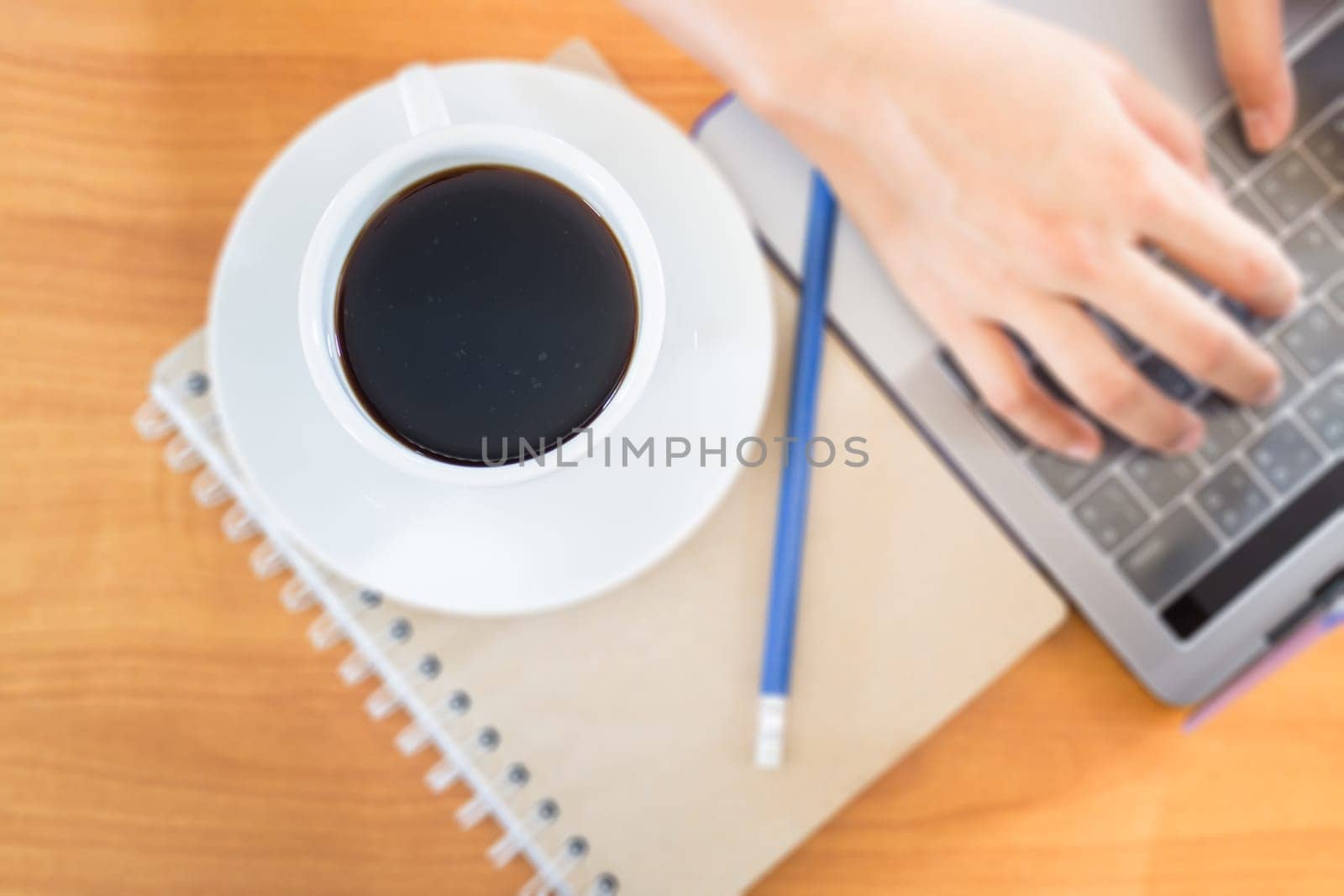 Hot Cup Of Coffee On Working Table, stock photo