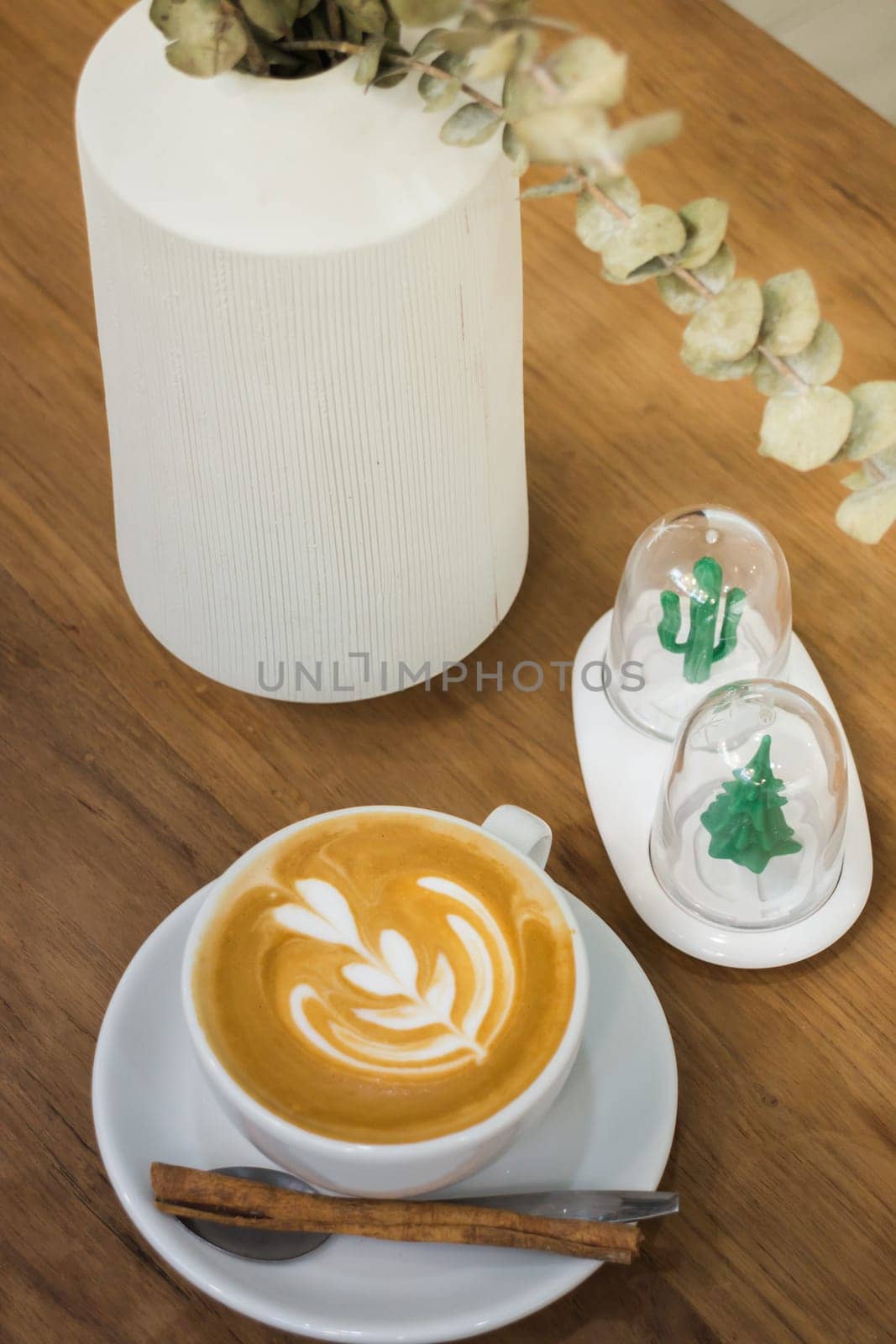 Coffee With Latte Art On Wooden Table, stock photo