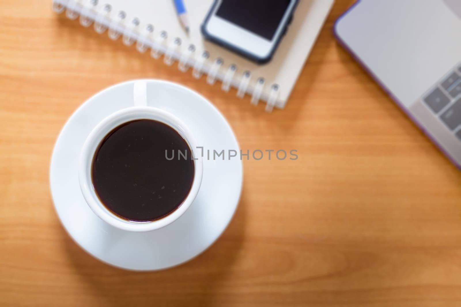 Hot Cup Of Coffee On Working Table, stock photo