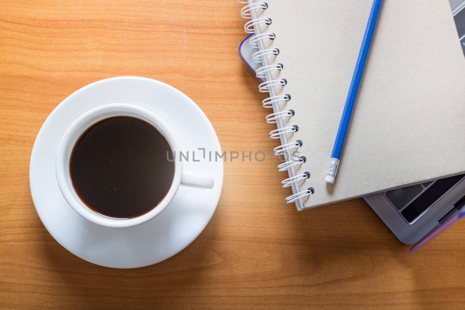 Hot Cup Of Coffee On Working Table, stock photo