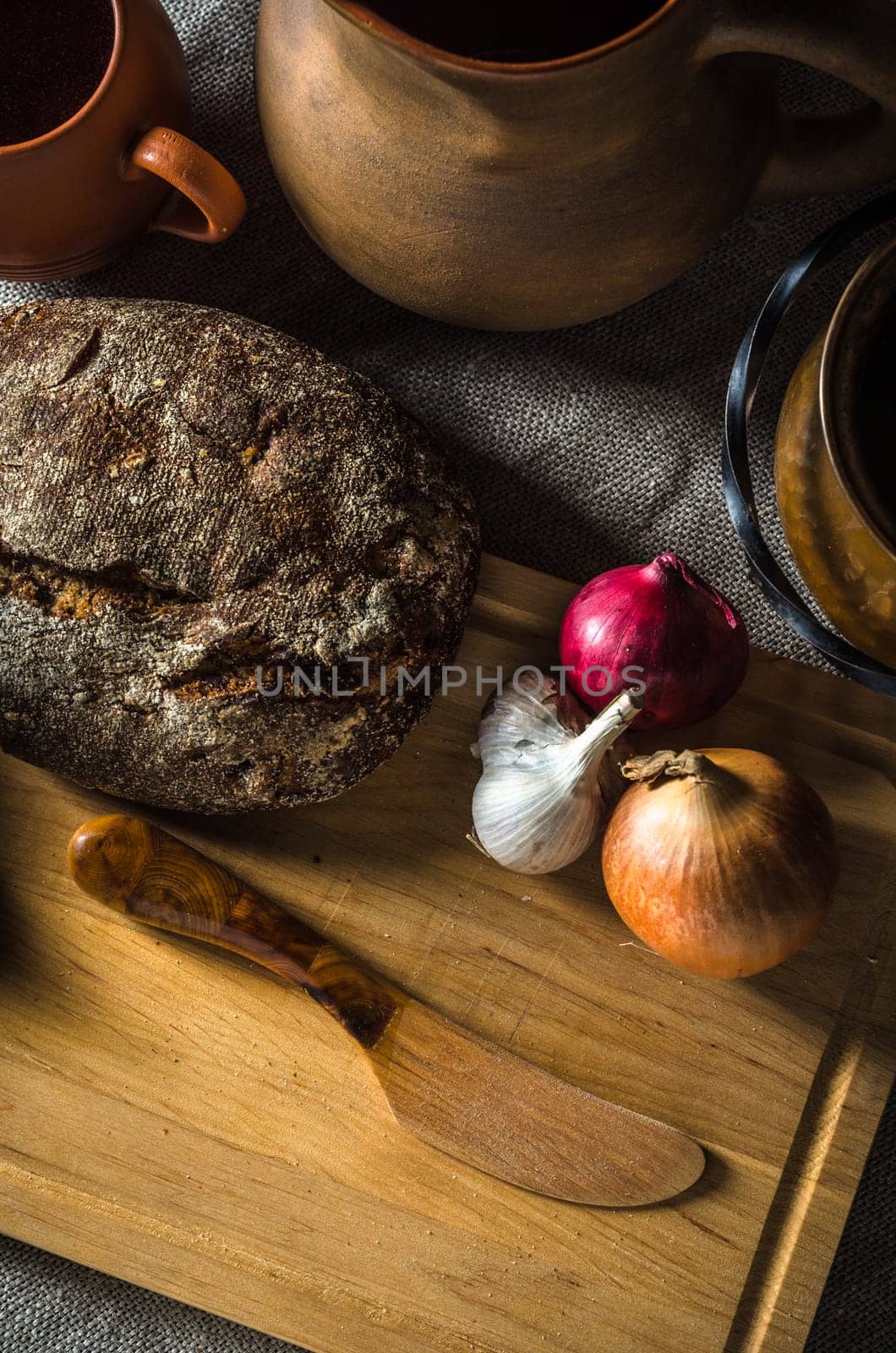 Top view on homemade bread and onions