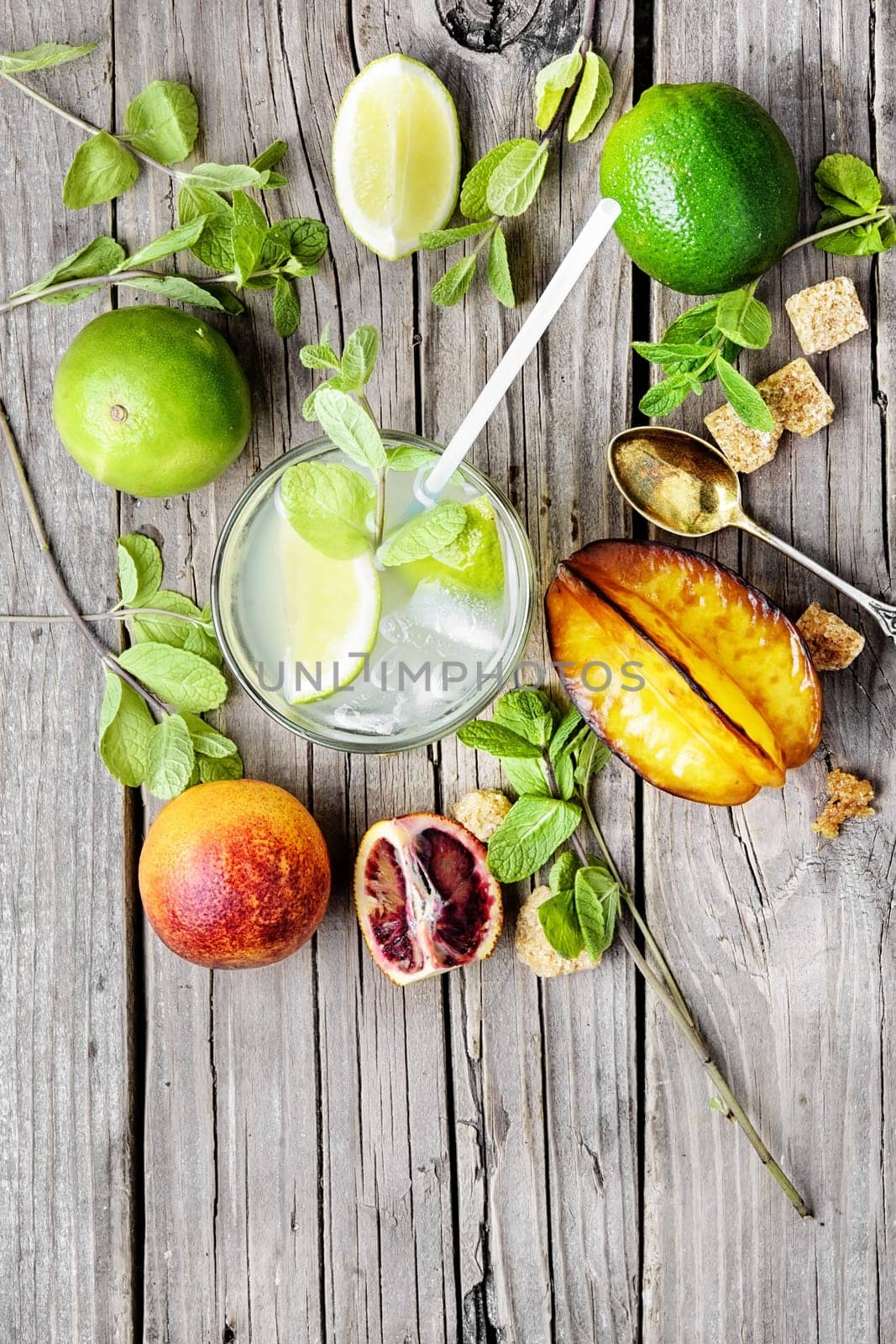 refreshing vegan drink with fresh lime,orange, mint and averrhoa