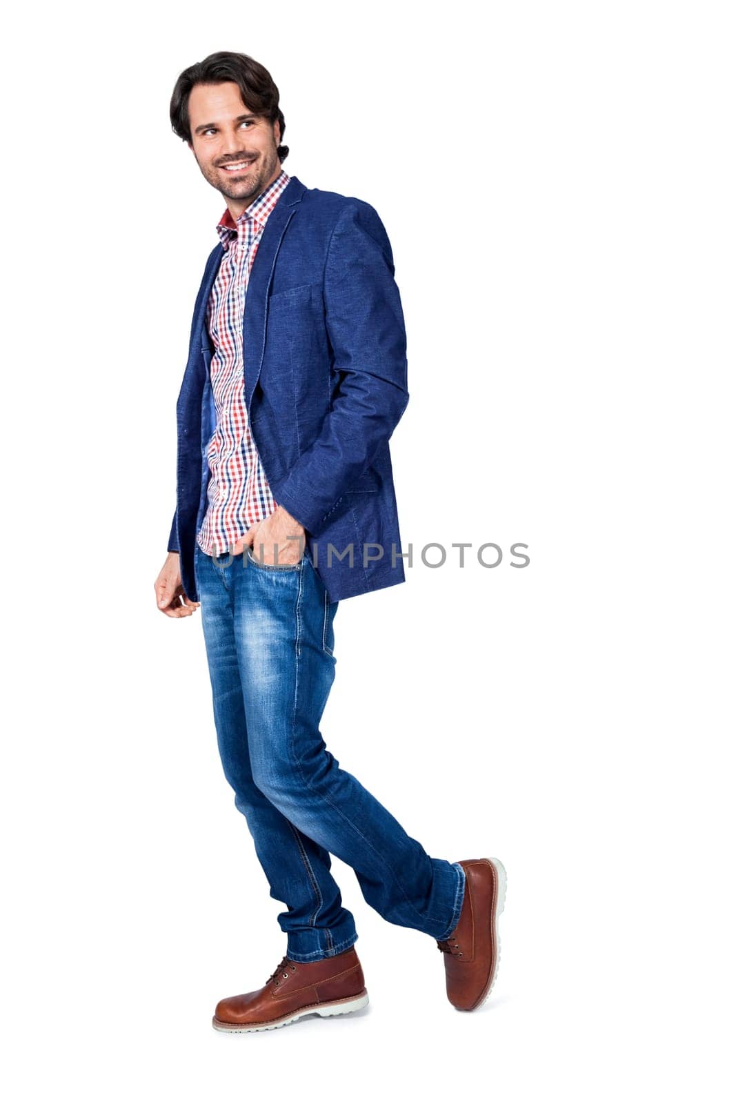 Young man in trendy casual look with dark hair and beard isolated against a white background