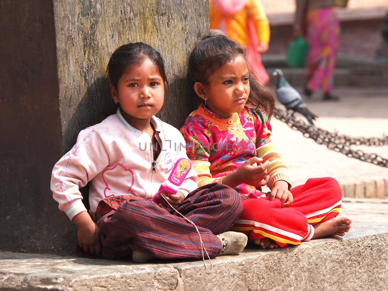 kids sitting on the street of kathmandu,Nepal