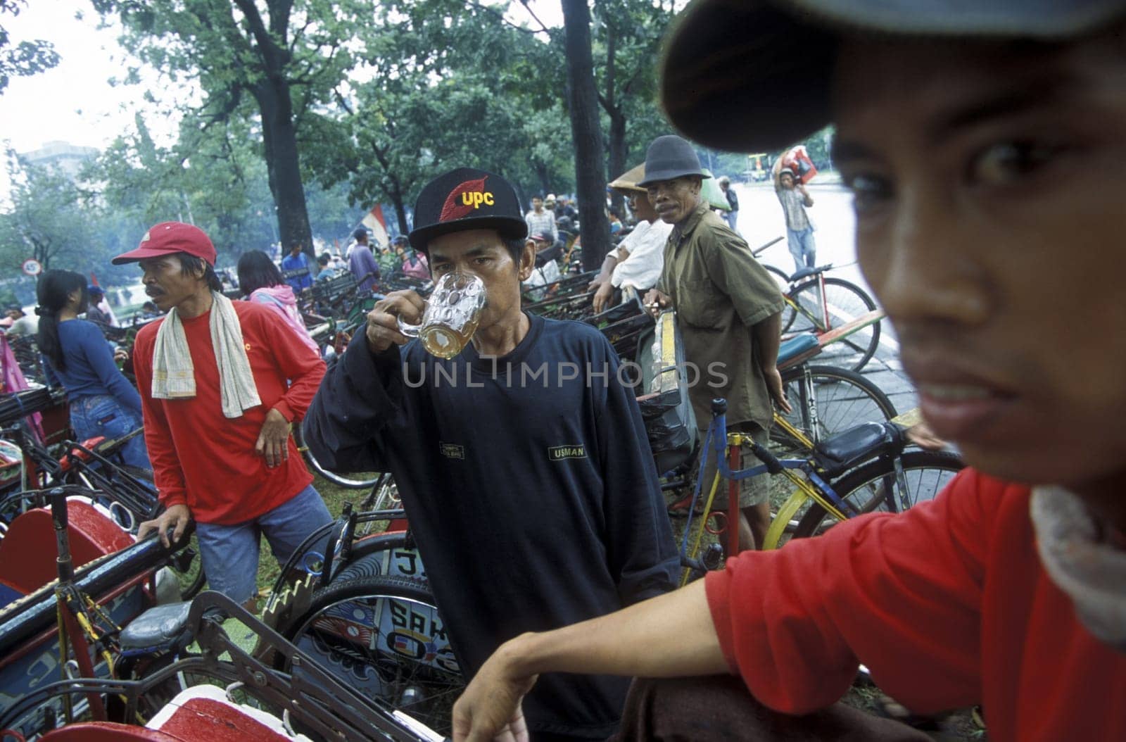a riksha taxi driver Protest in the city centre of Jakarta in Indonesia in Southeastasia.