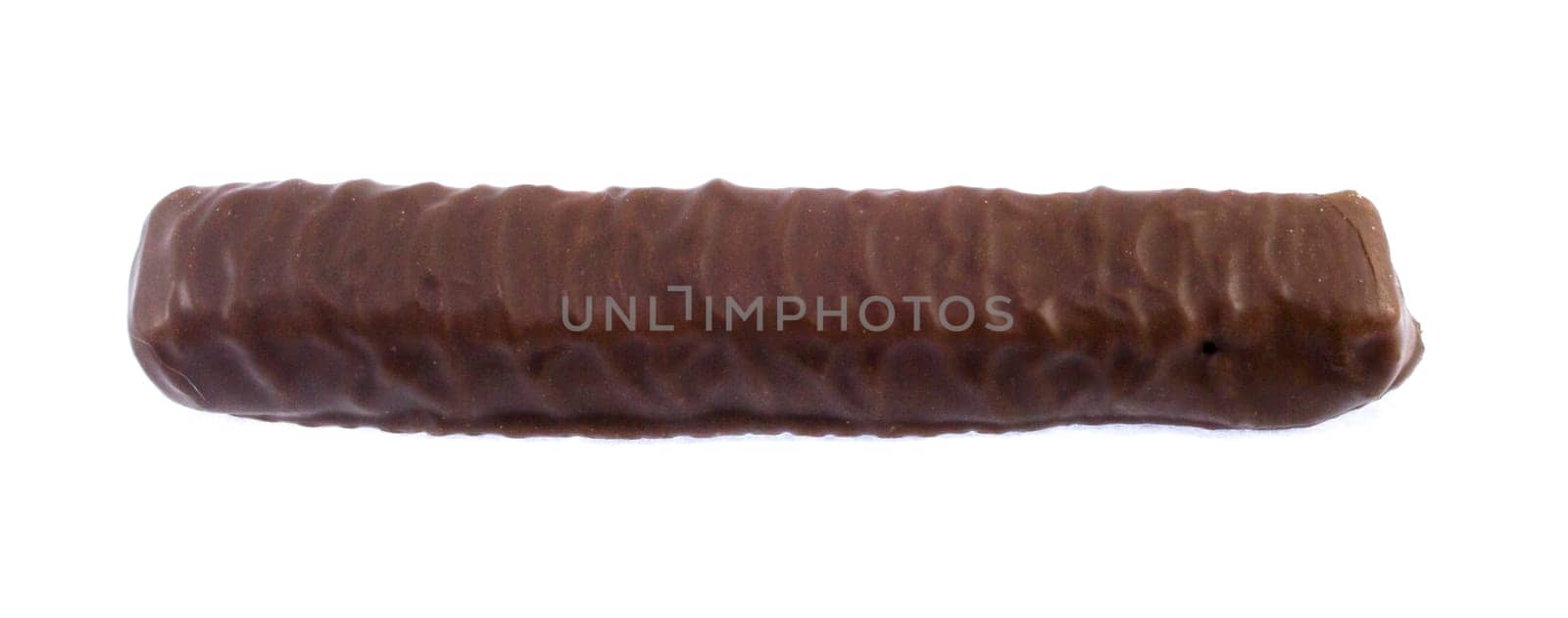 Closeup of chocolate bar isolated on white.