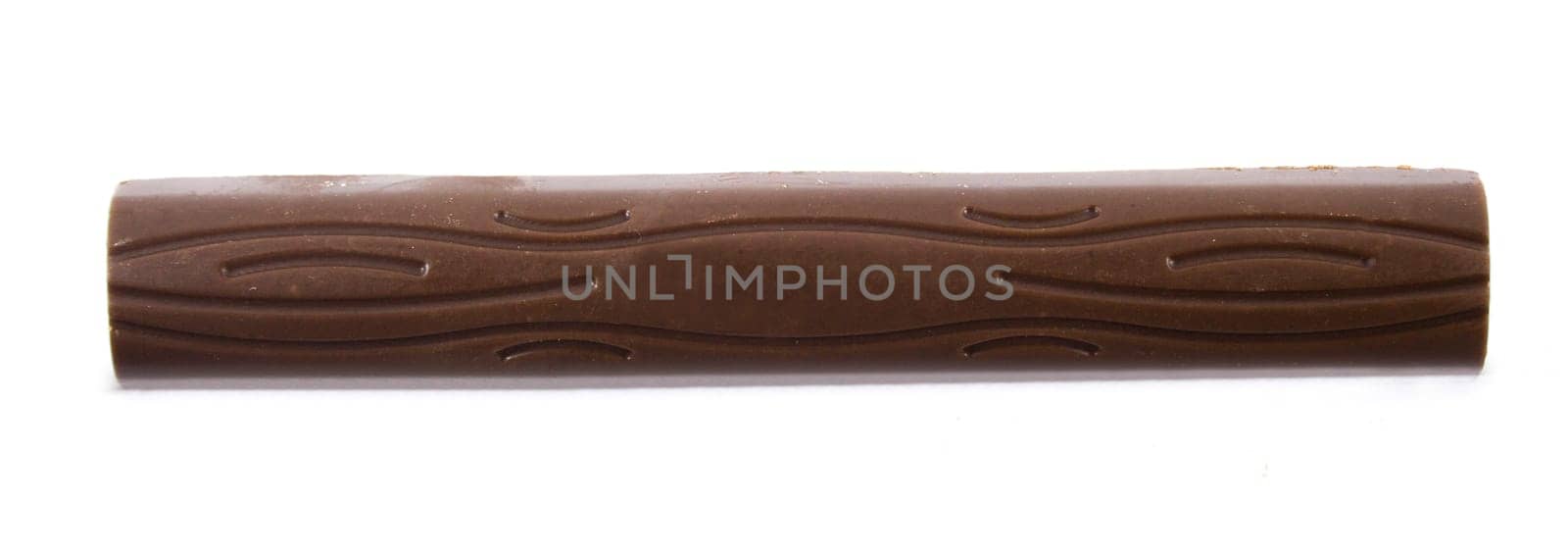 Closeup of chocolate bar isolated on white.