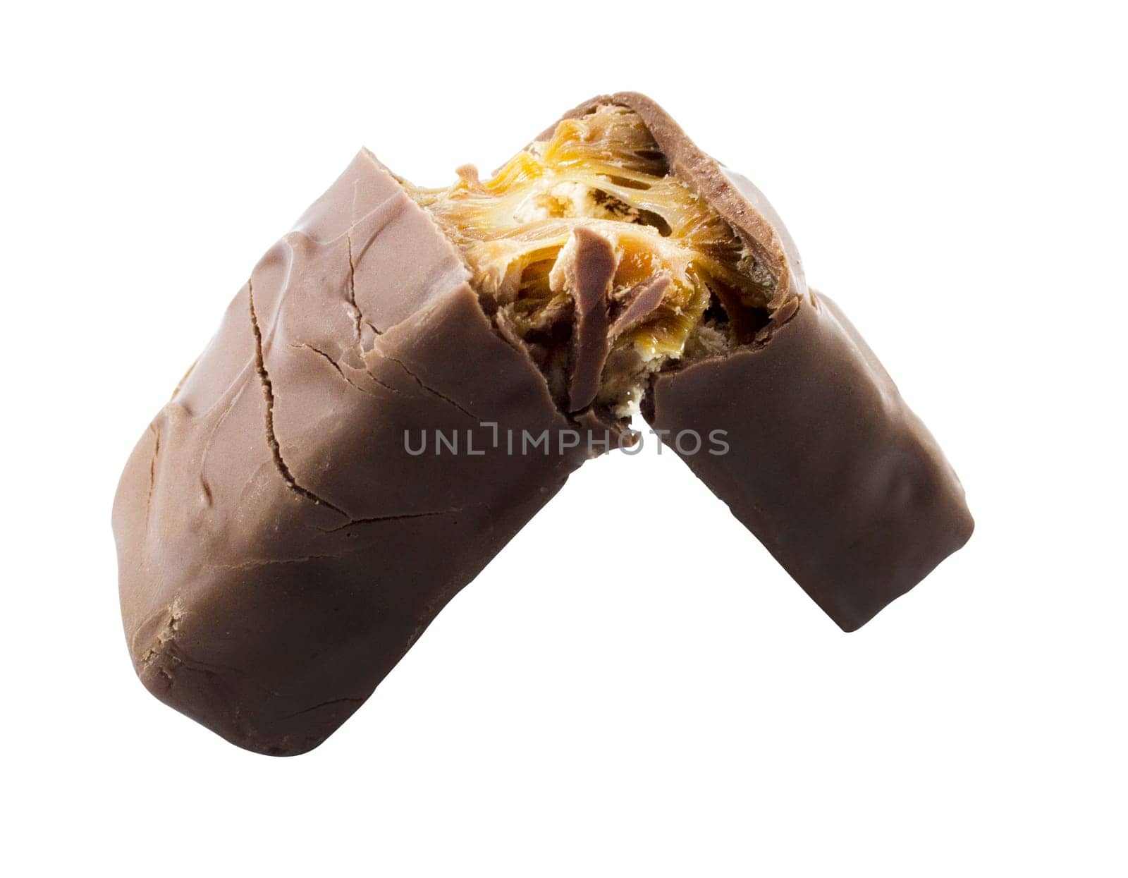 Closeup of chocolate bar with nuts isolated on white.