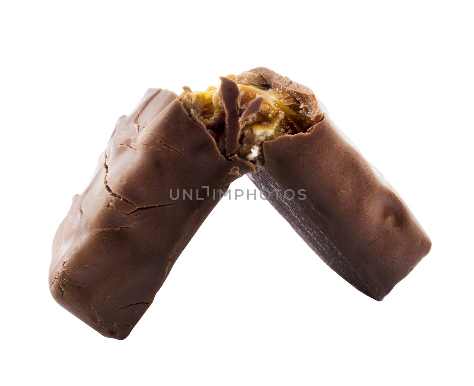 Closeup of chocolate bar with nuts isolated on white.