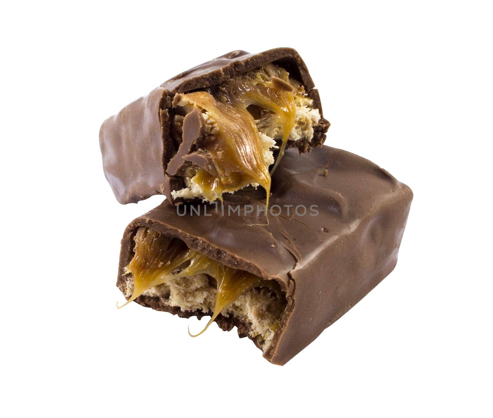 Closeup of chocolate bar with nuts isolated on white.