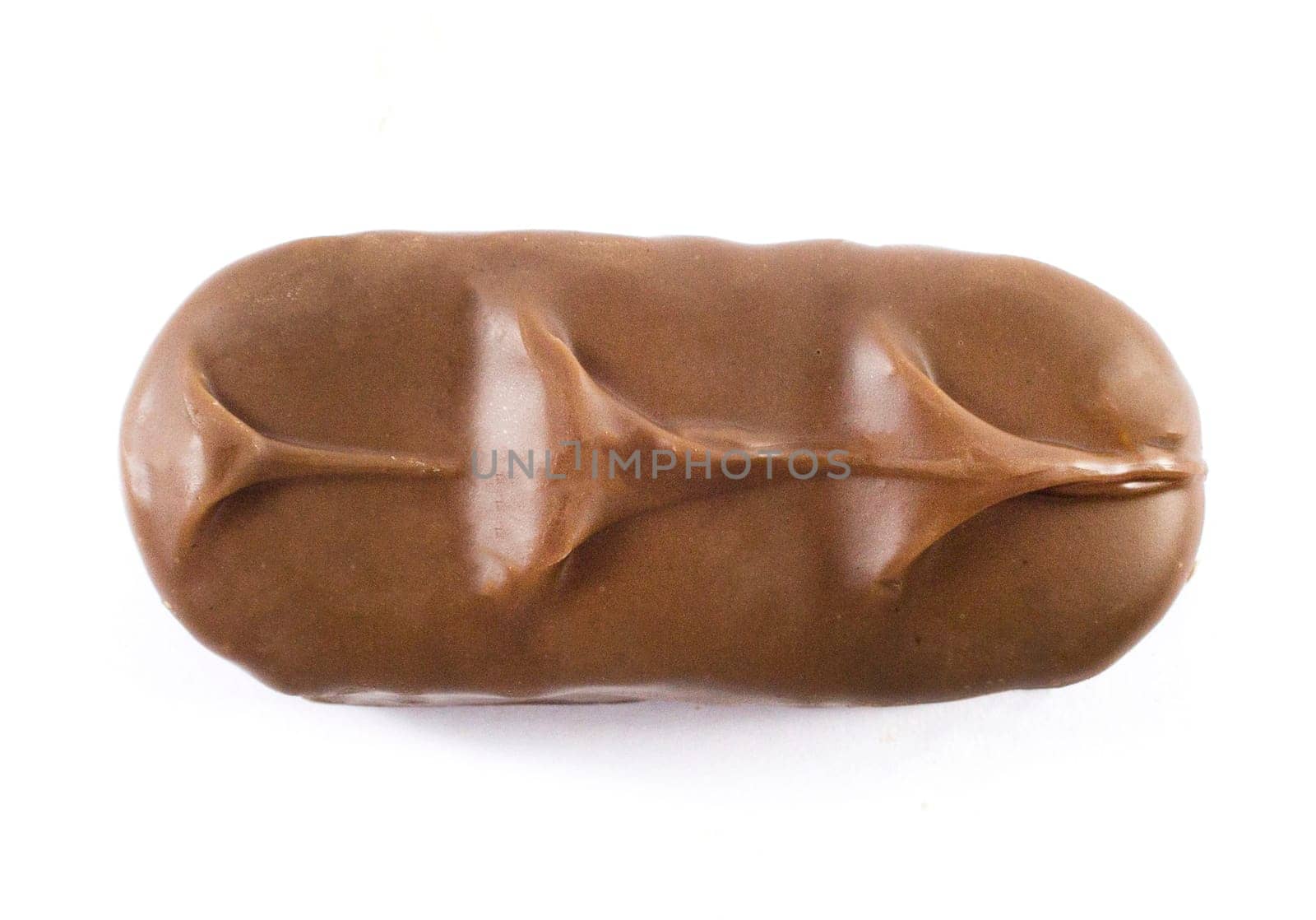 Closeup of chocolate bar isolated on white.