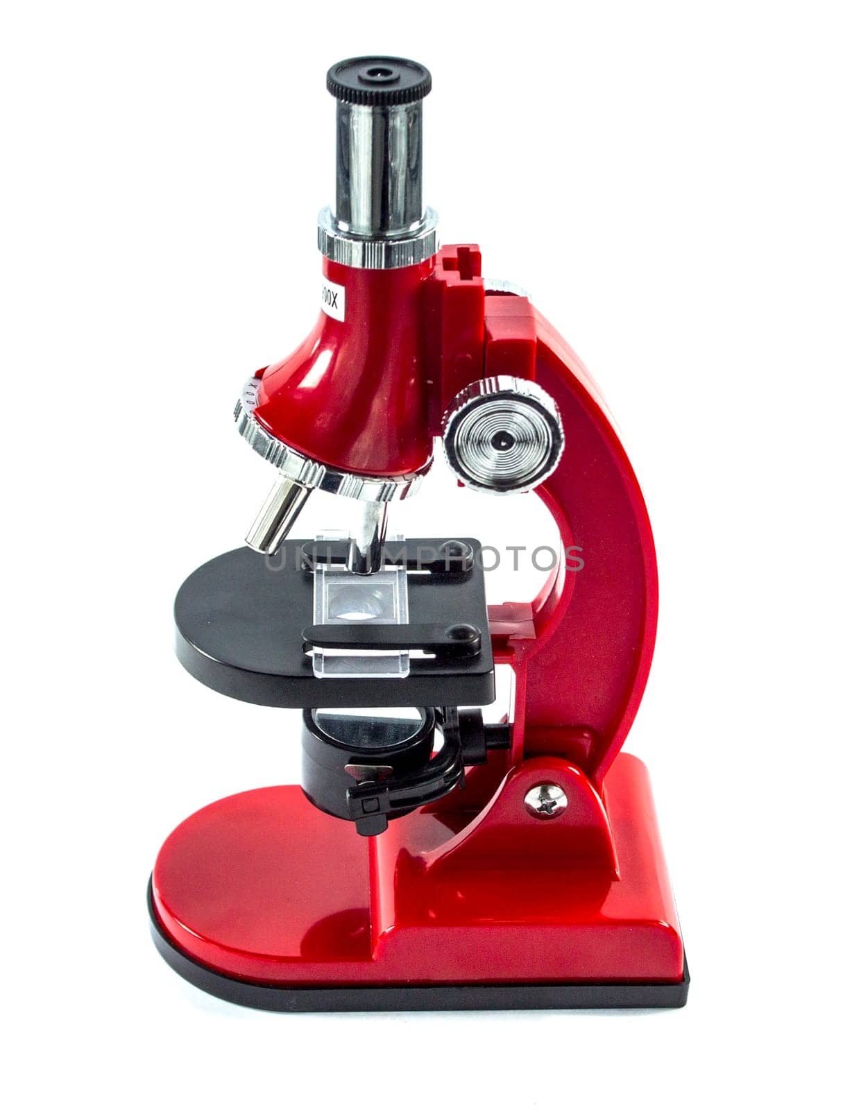 Modern red Microscope isolated on white background