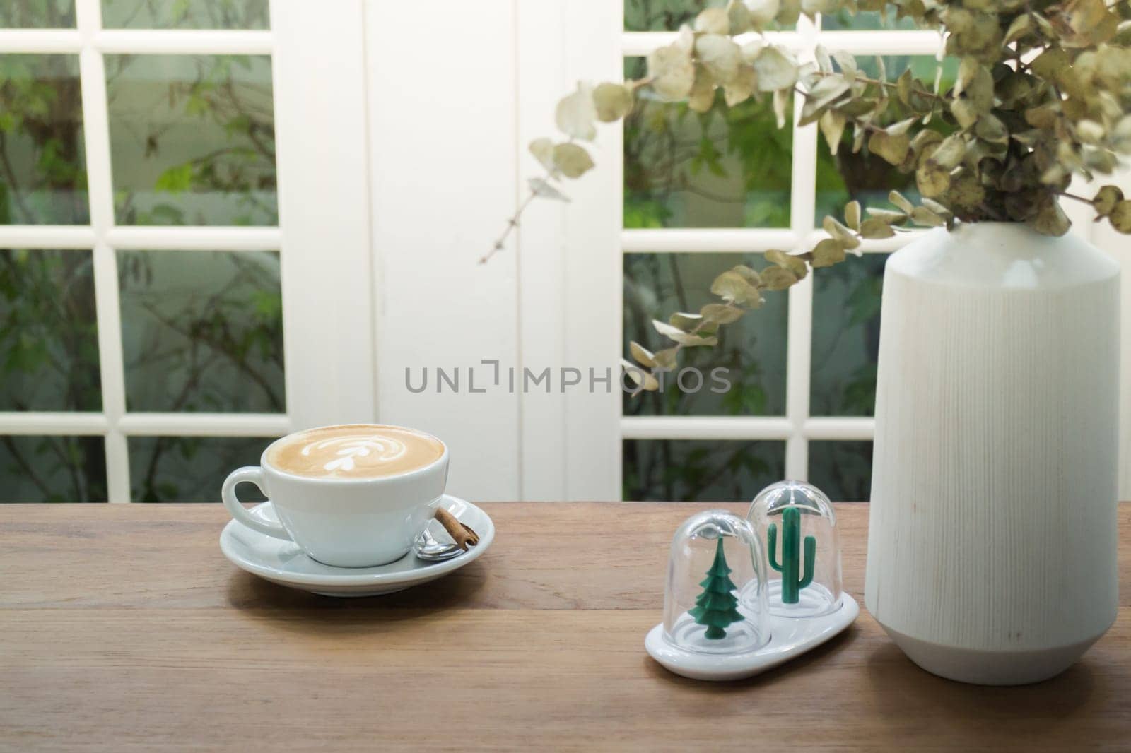 Coffee With Latte Art On Wooden Table, stock photo