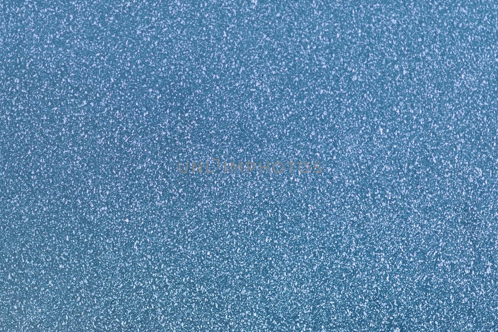 Close-up of frozen water on a glass pane