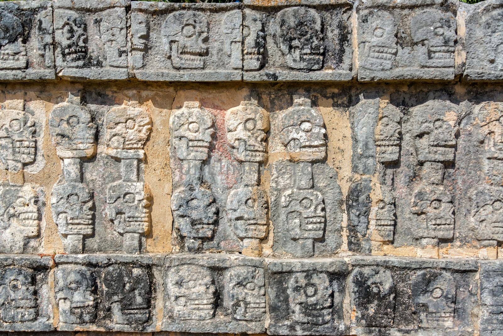 View of the platform of skulls in the ancient Mayan ruins of Chichen Itza in Mexico