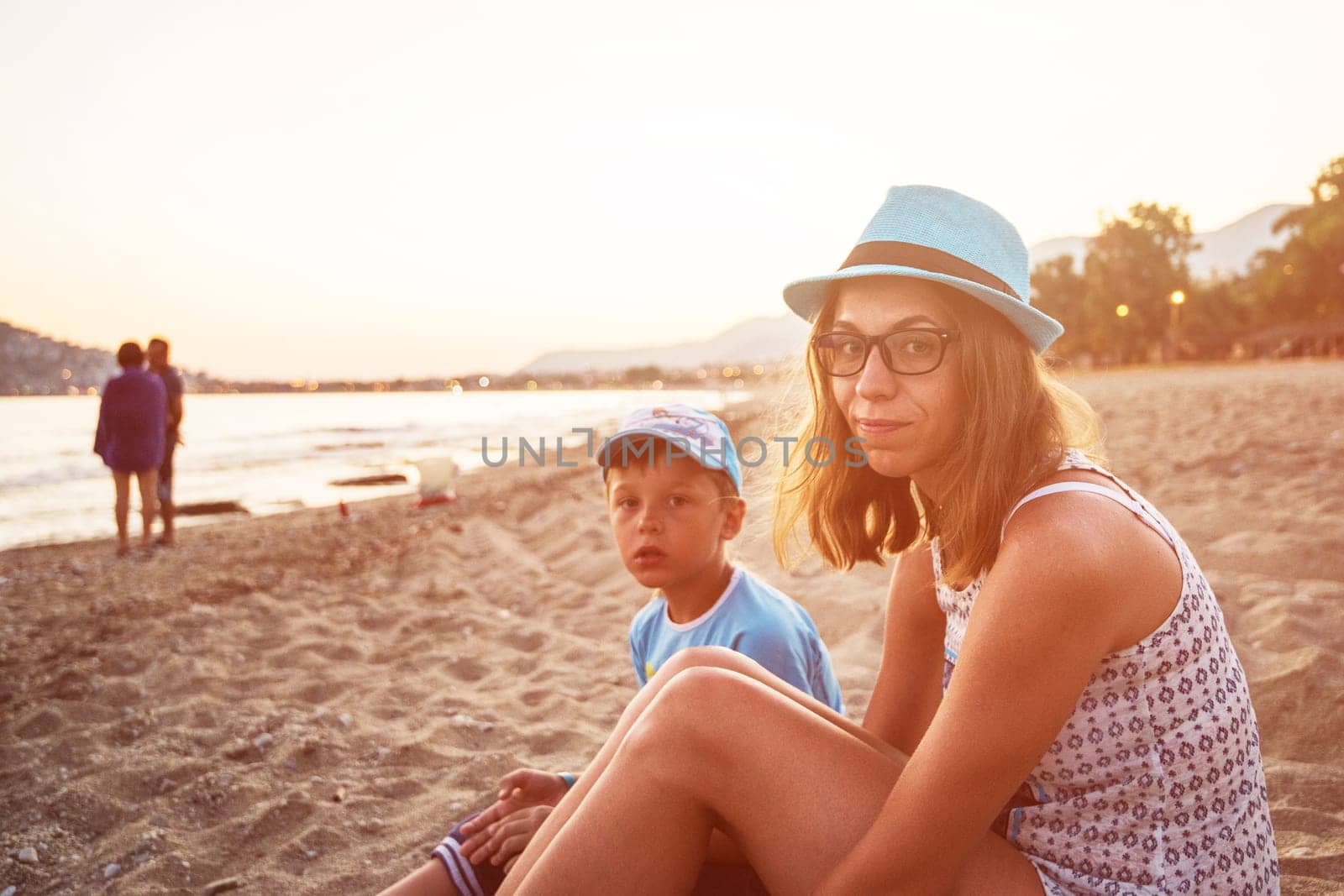 Mother and son at Alanya beach, view from the beach, one of the famous destinations in Turkey.