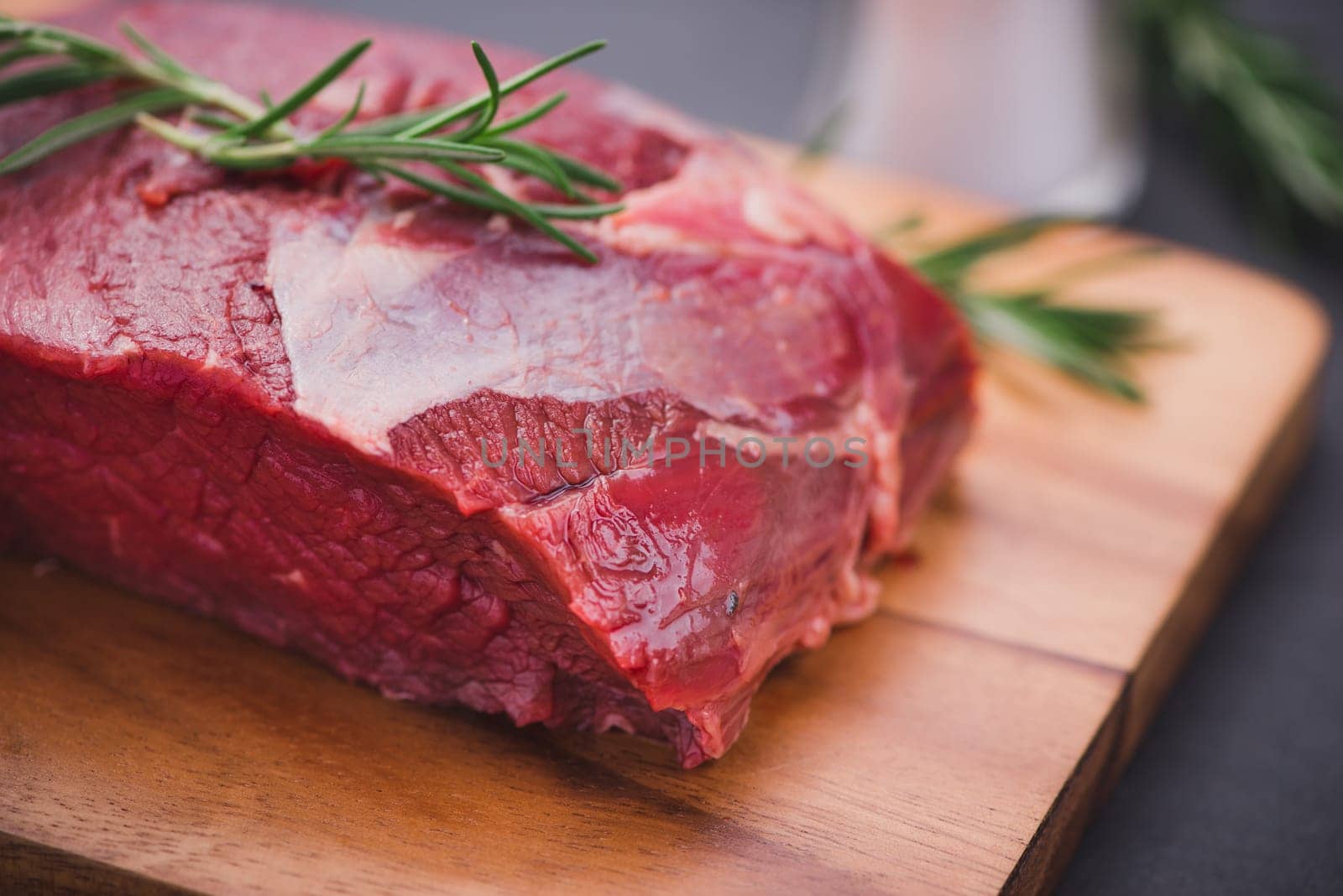 Raw beef meat on a cutting board