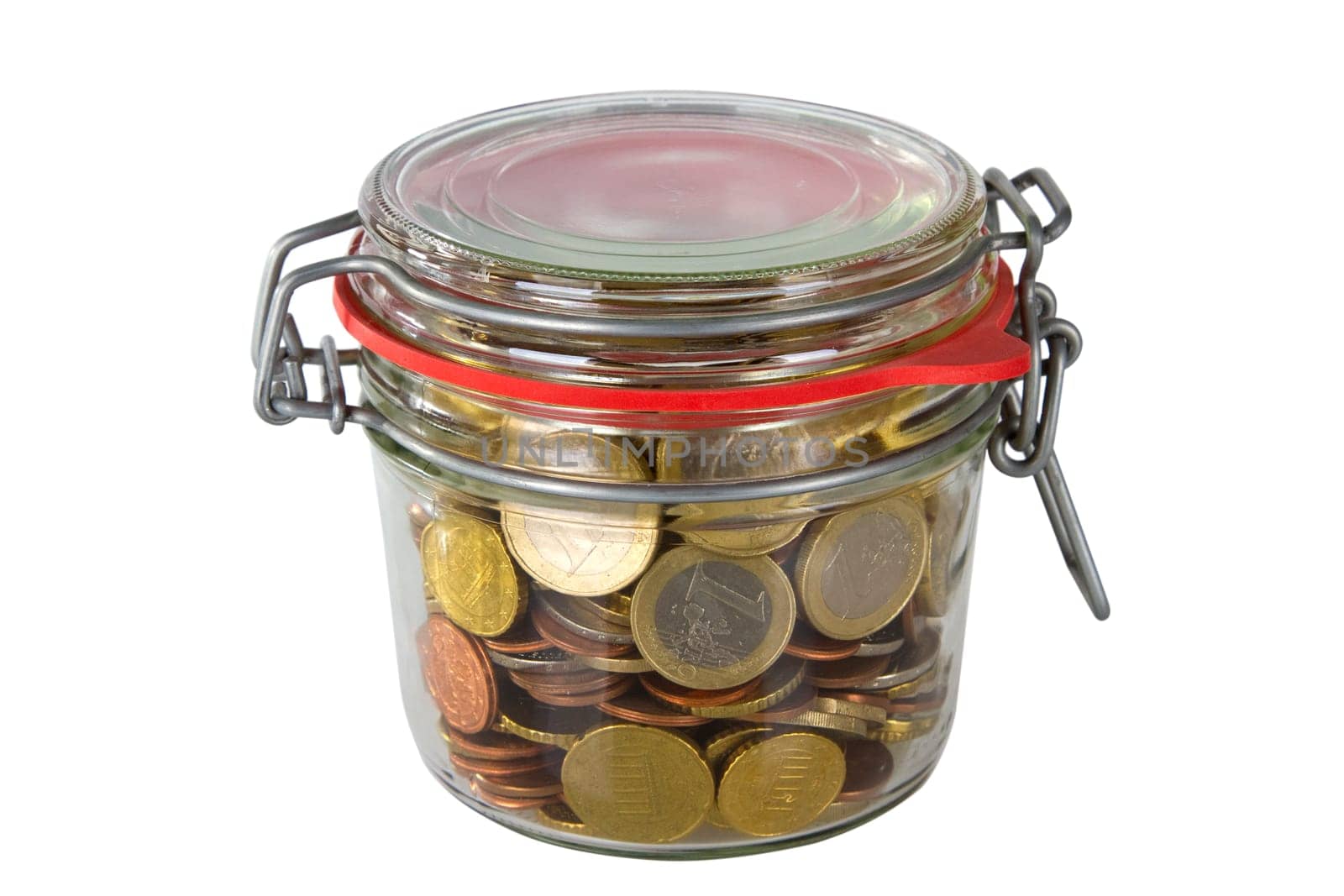 Wake-up glass filled with coins exposed on a white background