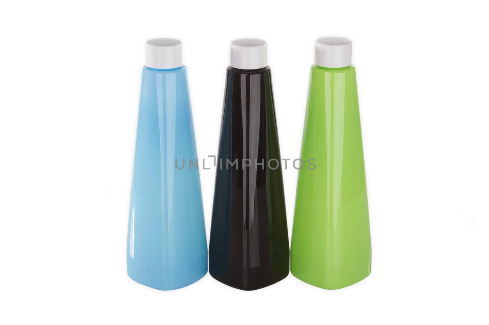 Three plastic bottles exposed on a white background